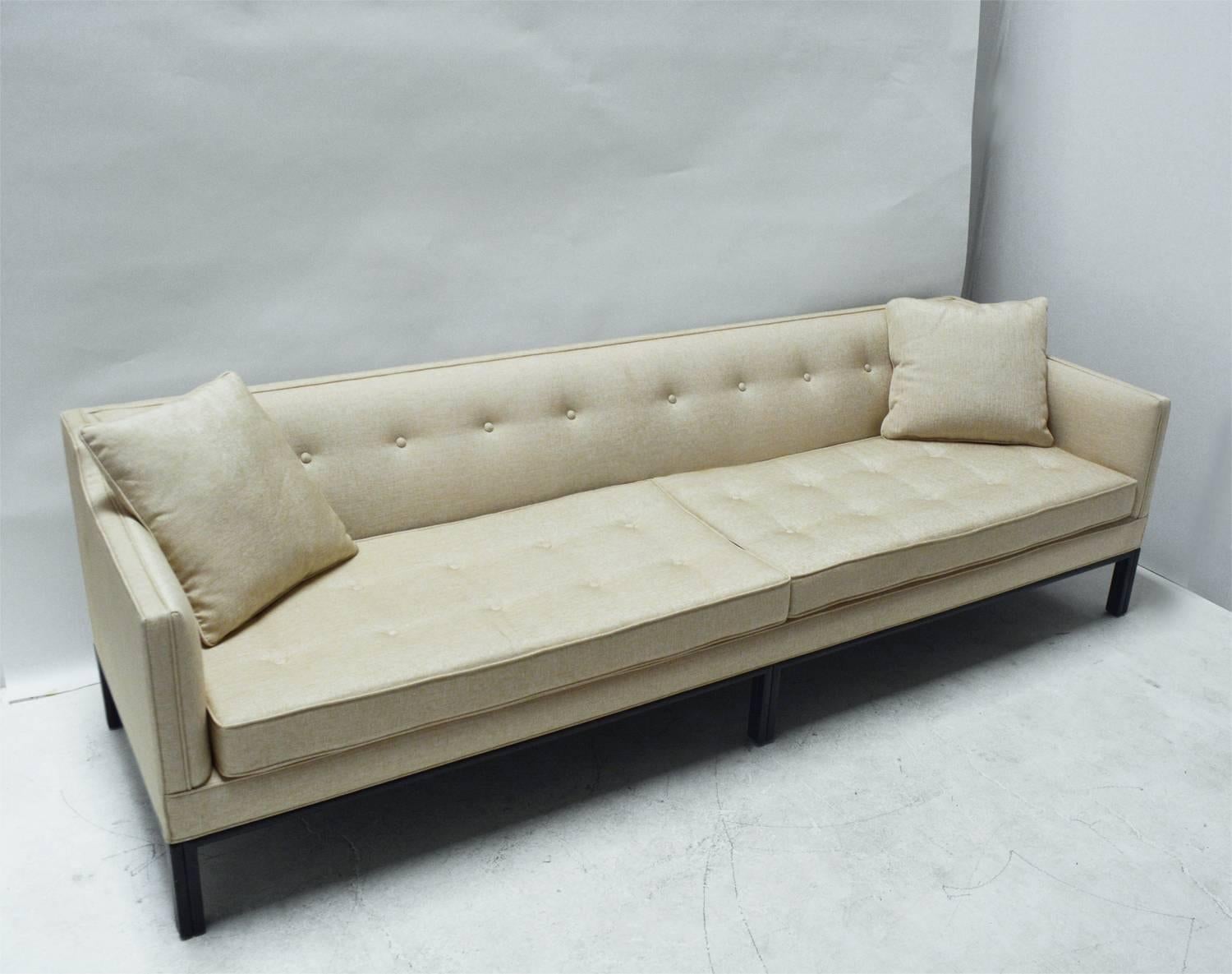 A good sofa by Edward Wormley for Dunbar, with dark walnut base and legs.