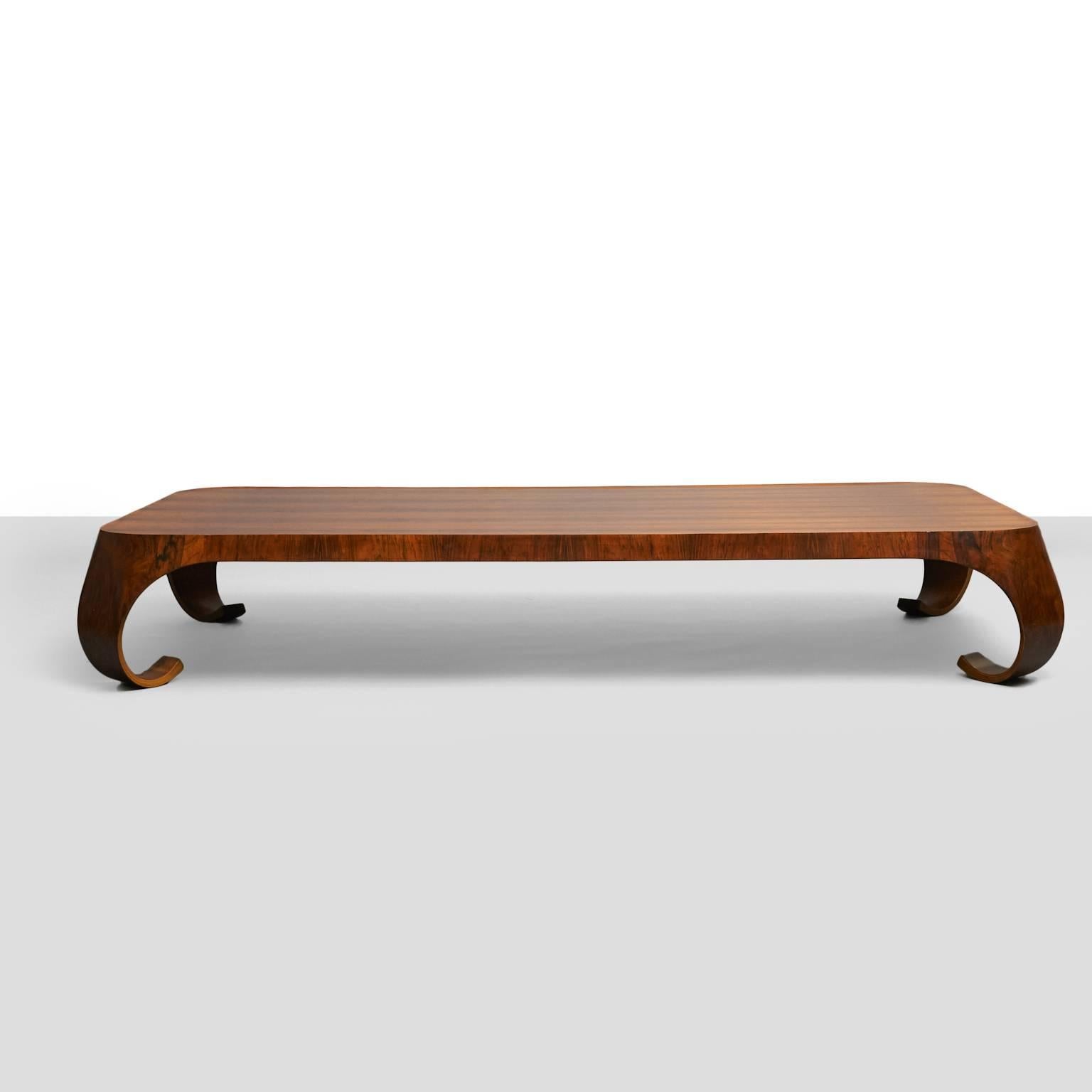 A rosewood coffee table by Isamu Kenmochi. This piece is longer and lower than standard models. Manufactured by Tendo Mokko.
Literature: Japanese Modern, Mori, pg. 143.