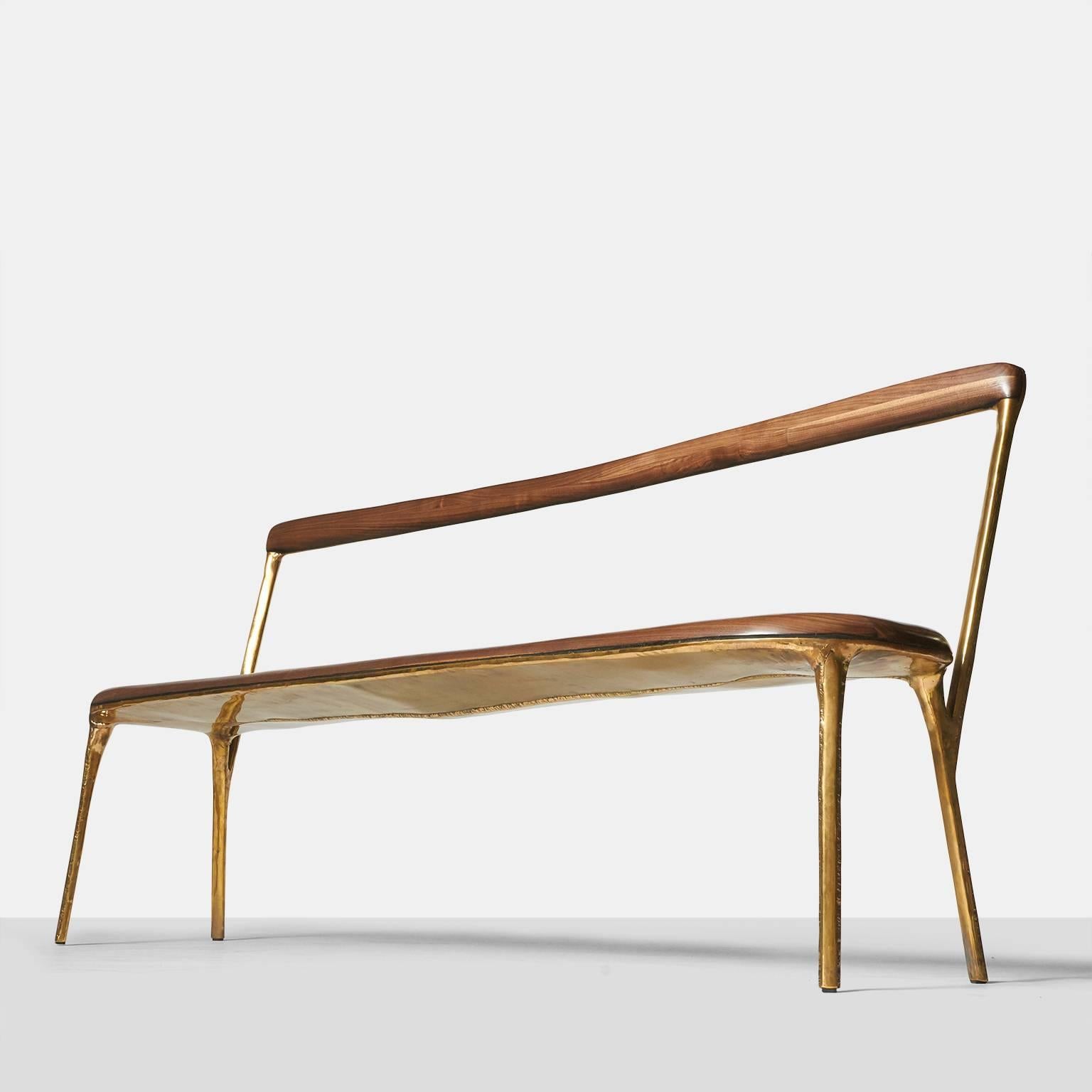 A bench in hand-worked bras with walnut seat and backrest. Incredible detail on all areas including the underside.
Each piece is completely handmade by Valentin Loellmann and all are signed and numbered. Valentin Loellmann was an award winner at PAD