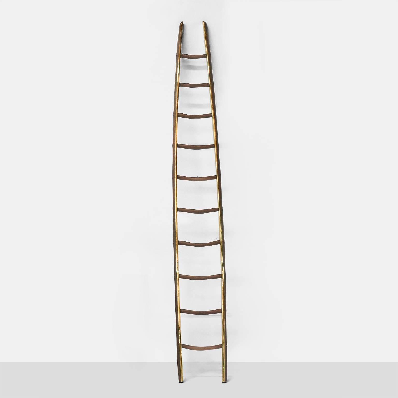A ladder in brass and black walnut with an organic shape, functional and decorative.
Each piece is completely handmade by Valentin Loellmann and all are signed and numbered. Almond & Company is the exclusive gallery representing Valentin's work