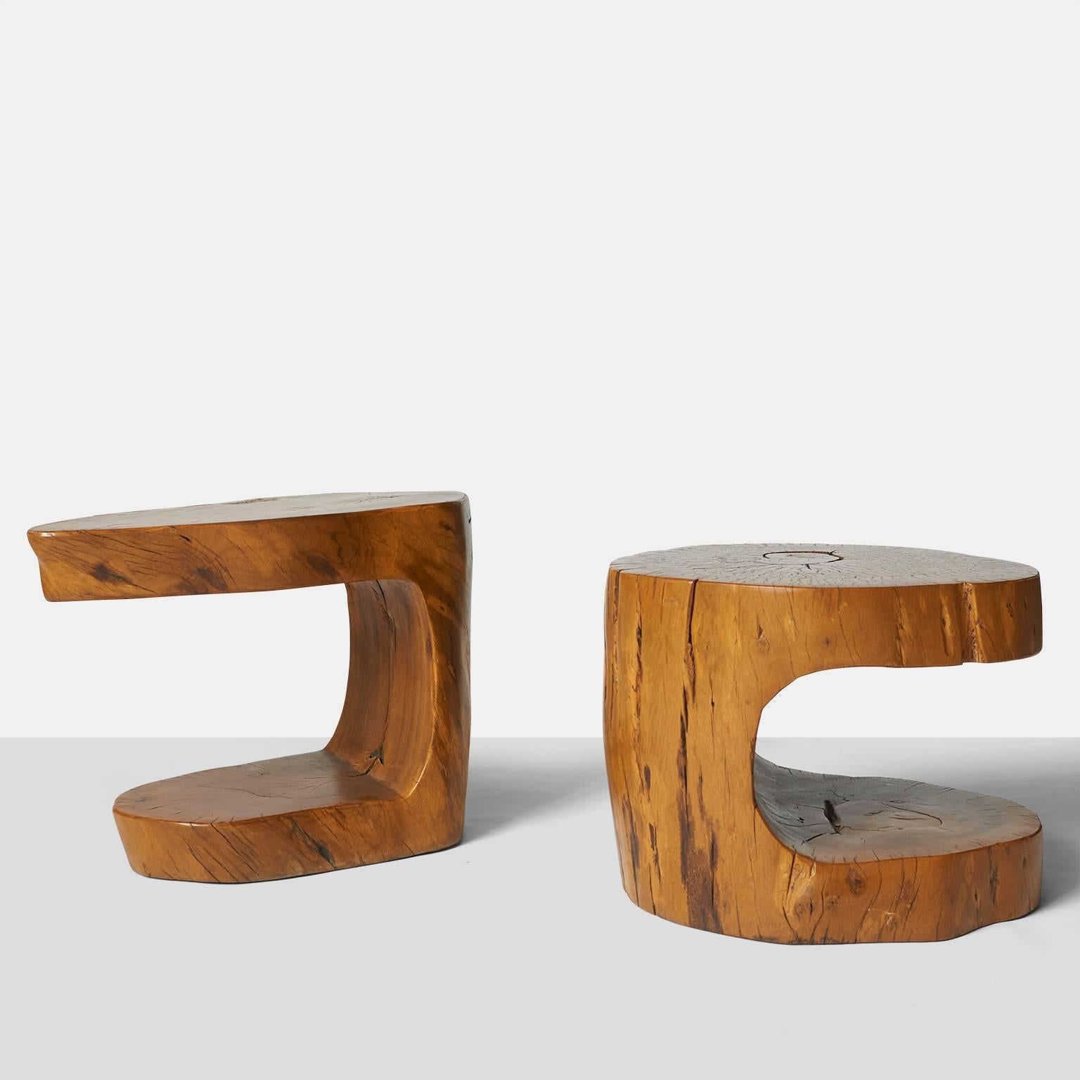 A pair of cantilever shape side tables by Hugo Franca made from naturally fallen Brazilian hardwood and signed by the designer. Each table is oval in shape and vary in size.
Price shown is for the pair of tables.
Brazil, circa 1990.