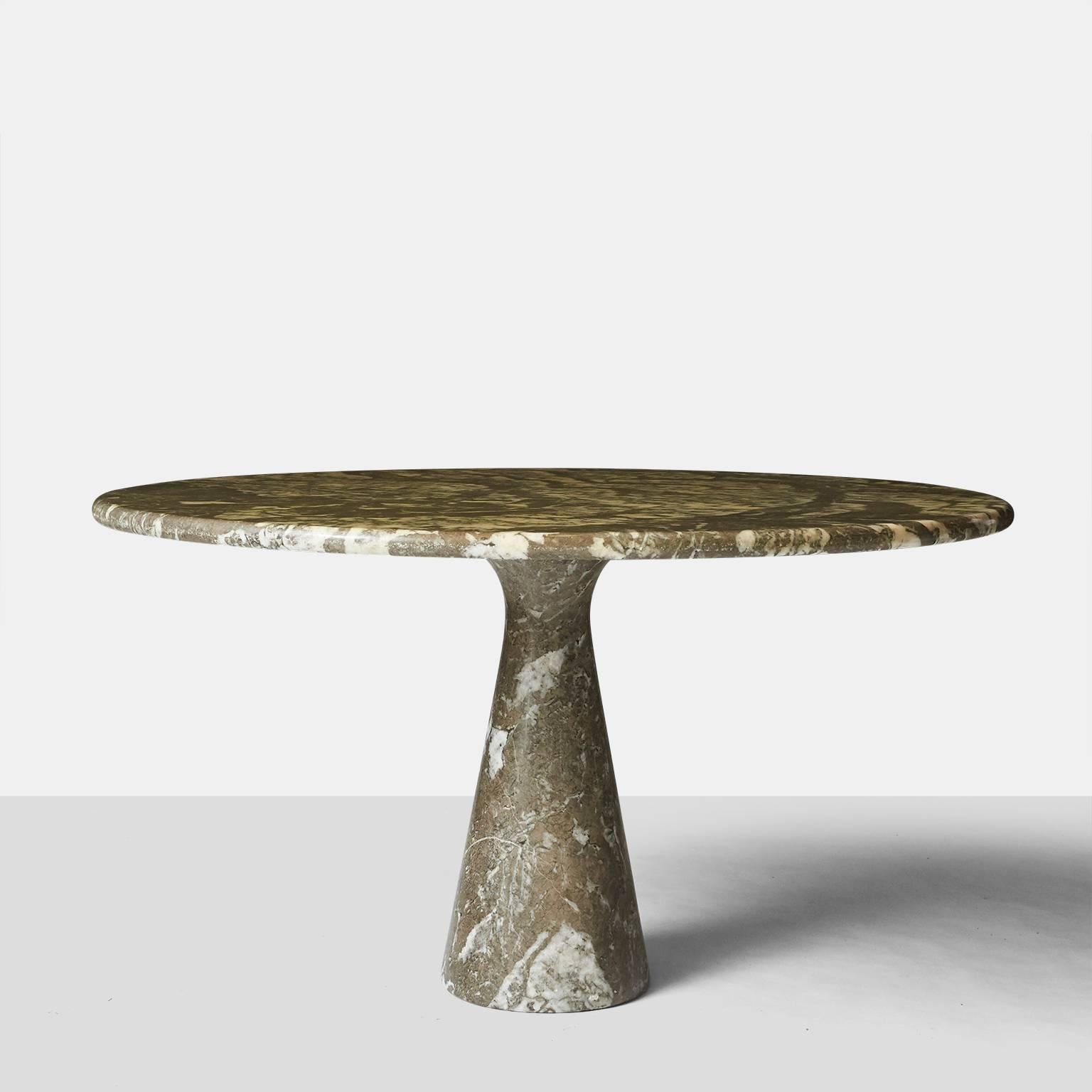 A dining or center table in gray marble by Angelo Mangiarotti. This Eros collection table with a rounded edge was made in Italy, circa 1975.