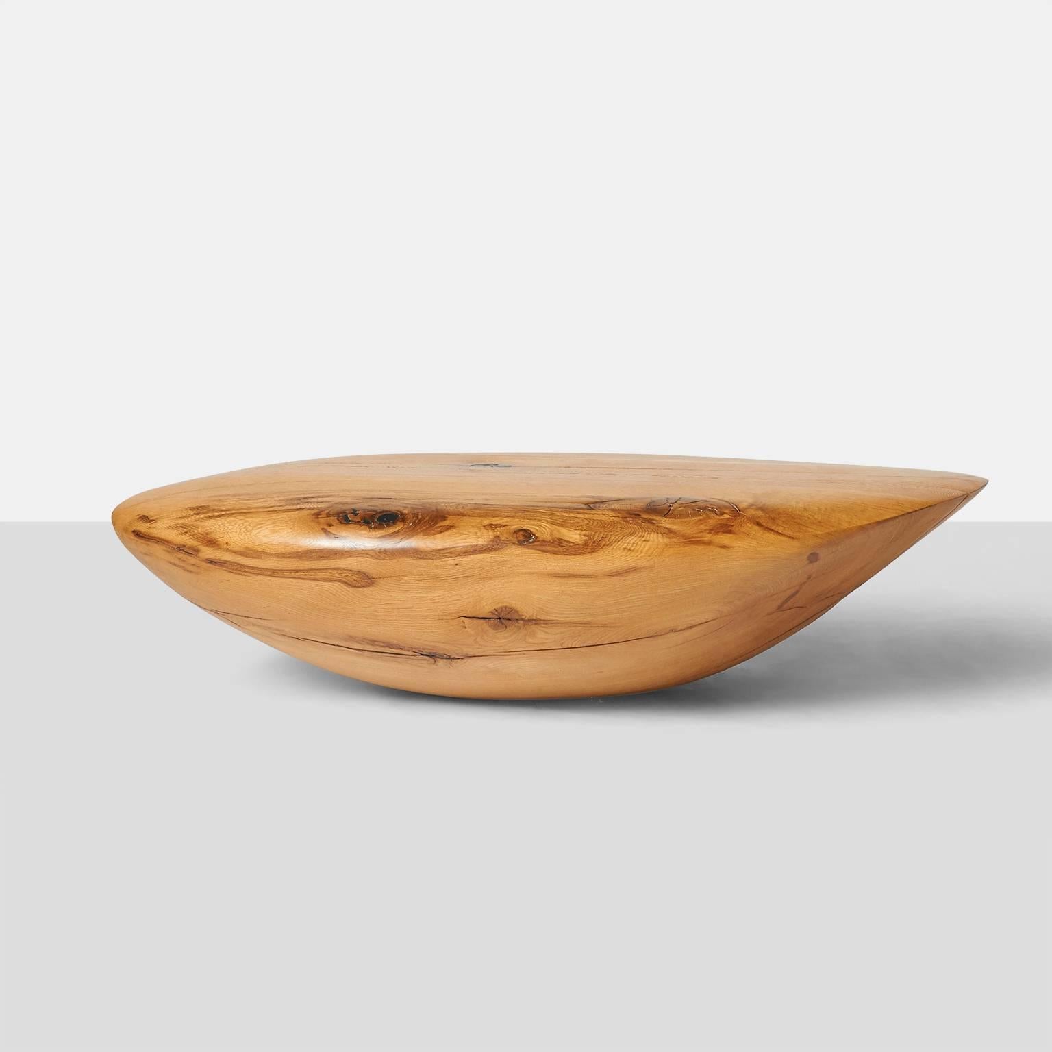 A large pebble shaped coffee table by German artist Kaspar Hamacher from the trunk of a solid piece of naturally fallen oak. 
Almond + Co. is the exclusive gallery selected to represent all work by Kaspar in the U.S.