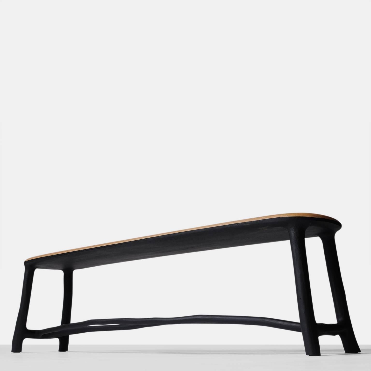 An elegantly proportioned bench in oak with the frame of naturally shaped blackened hazel branches. Each piece is completely handmade by Valentin Loellmann and all are signed and numbered. Each piece is an original work of art.
Valentin Loellmann