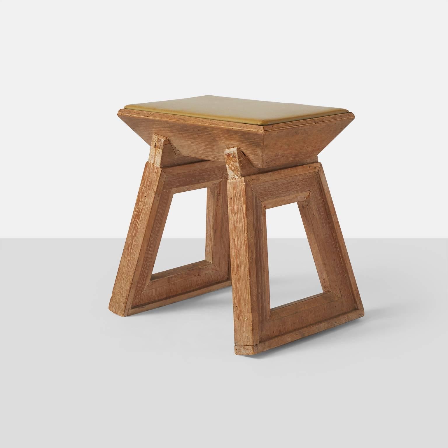 A unique architectural stool in limed oak with a leather seat. Framework legs make this a very heavy and sturdy seat,
circa 1940s, USA.