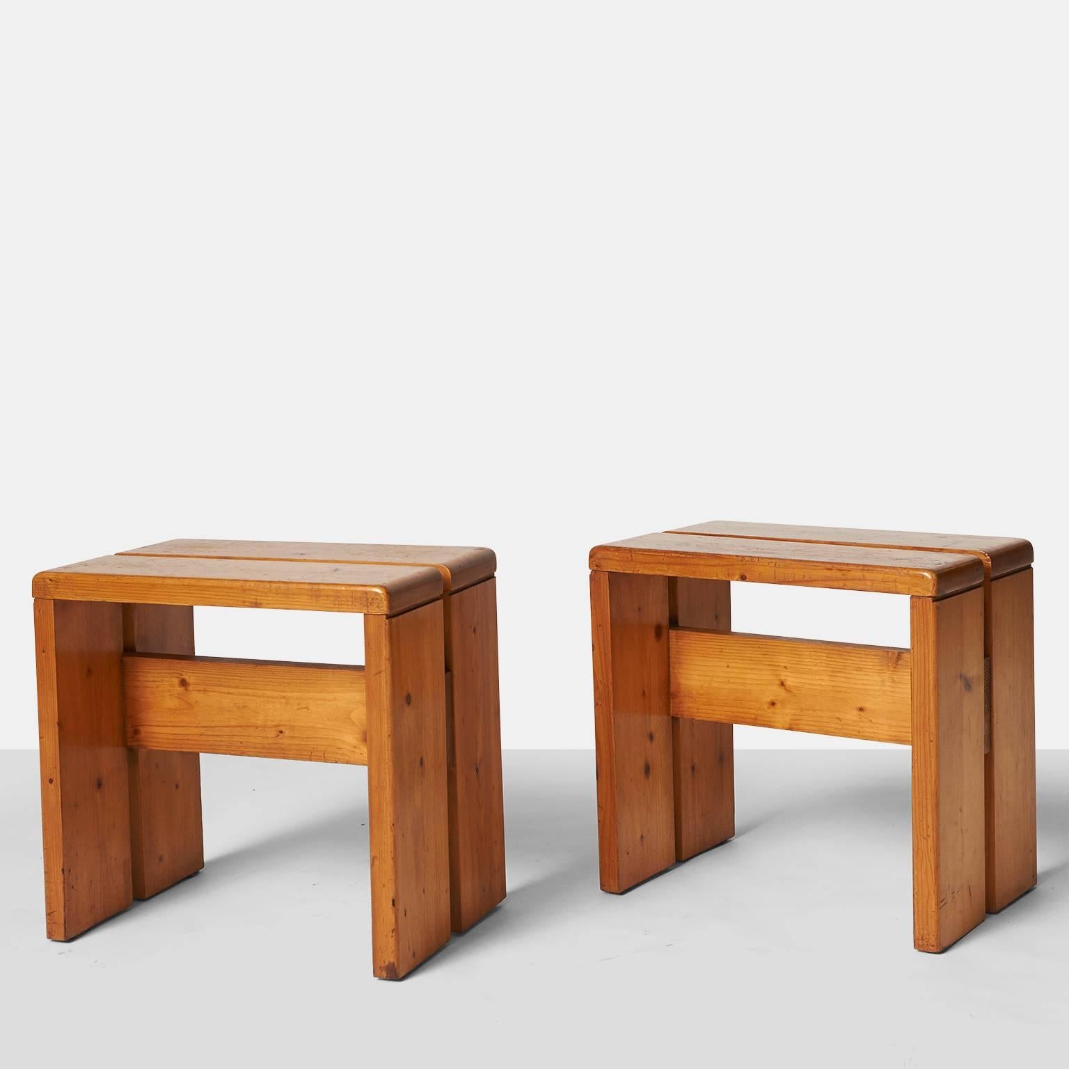 A pair of rectangular stools in pine by Charlotte Perriand. The stools were designed for the Arc 1600 ski resort in Les Arcs (1967-1969), built by a team of architects, including Perriand. The finish is naturally aged pine.
France, circa 1960s.