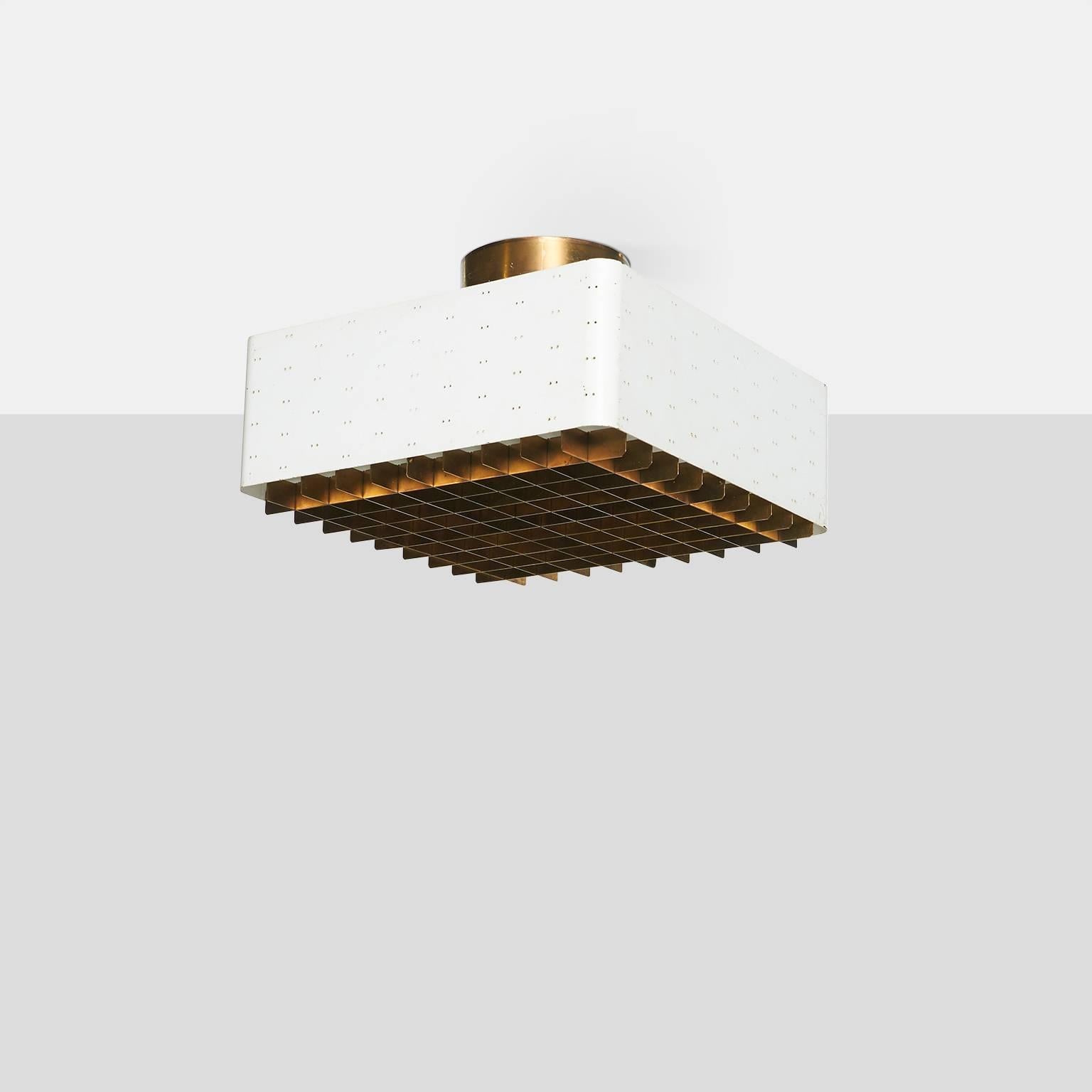 A square form ceiling fixture in white with brass grid diffuser and etched glass filter. Manufactured by Idman Oy. 
Finland, circa 1960s.