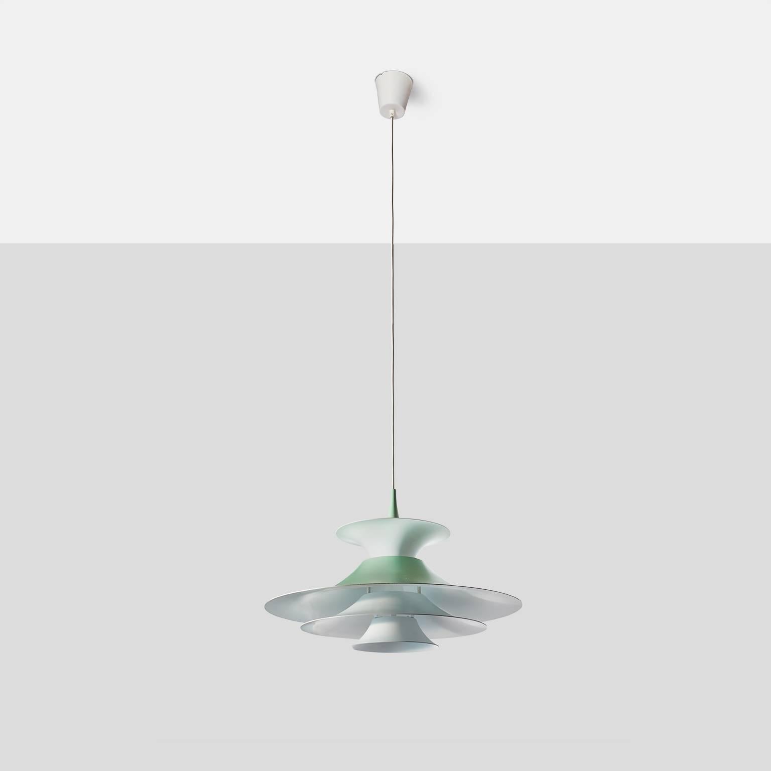 A pendant lamp designed by Eric Balslev and produced by Fog & Mørup in Denmark, circa 1970, made of enameled aluminum. Painted in ivory and celery.
Denmark, circa 1970
Eric Balslev for Fog & Mørup.
 