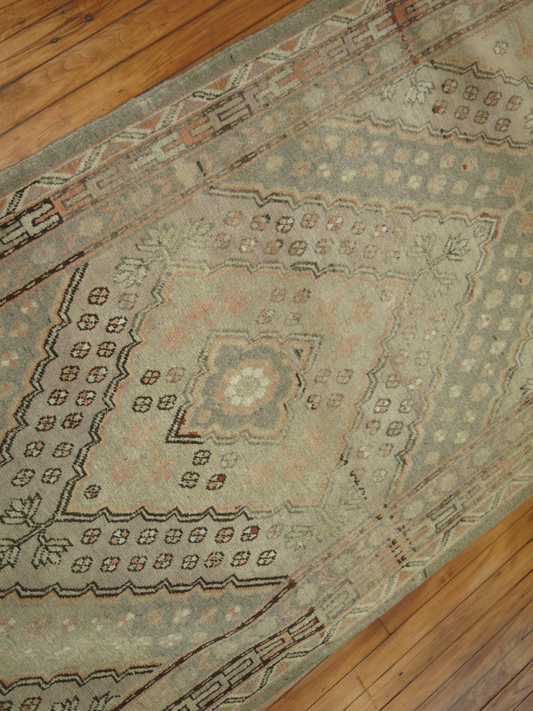 One of our most interesting finds to date.
A set of rare Khotan runners, each having a repeating diamond motifs in earth tone hues surrounded by thin multi band borders with several beautiful abrashes covering each field. 
Each measuring 3.7''