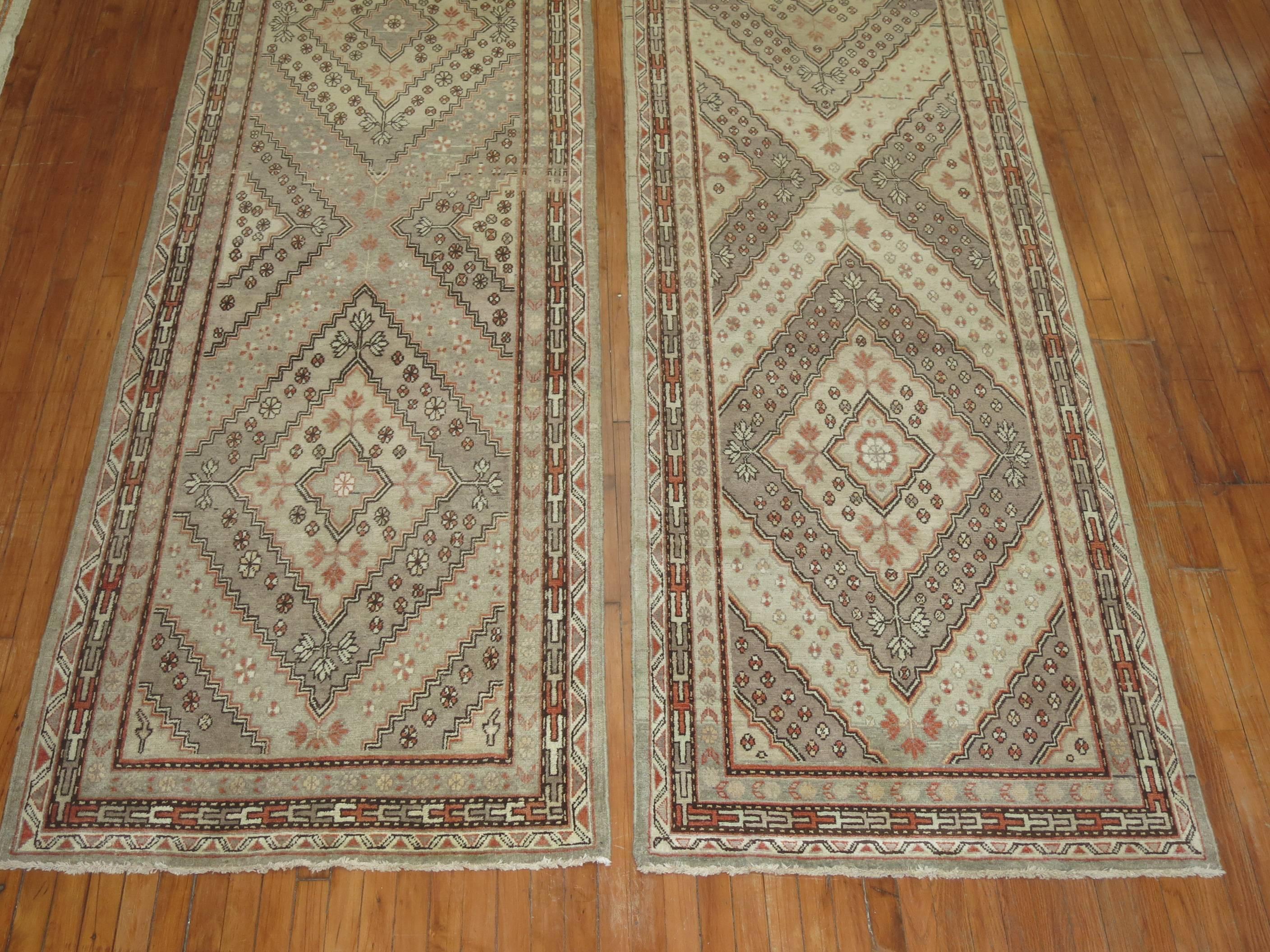 Hand-Knotted Rare Set of Antique Khotan Runners each measuring over 33 ft long