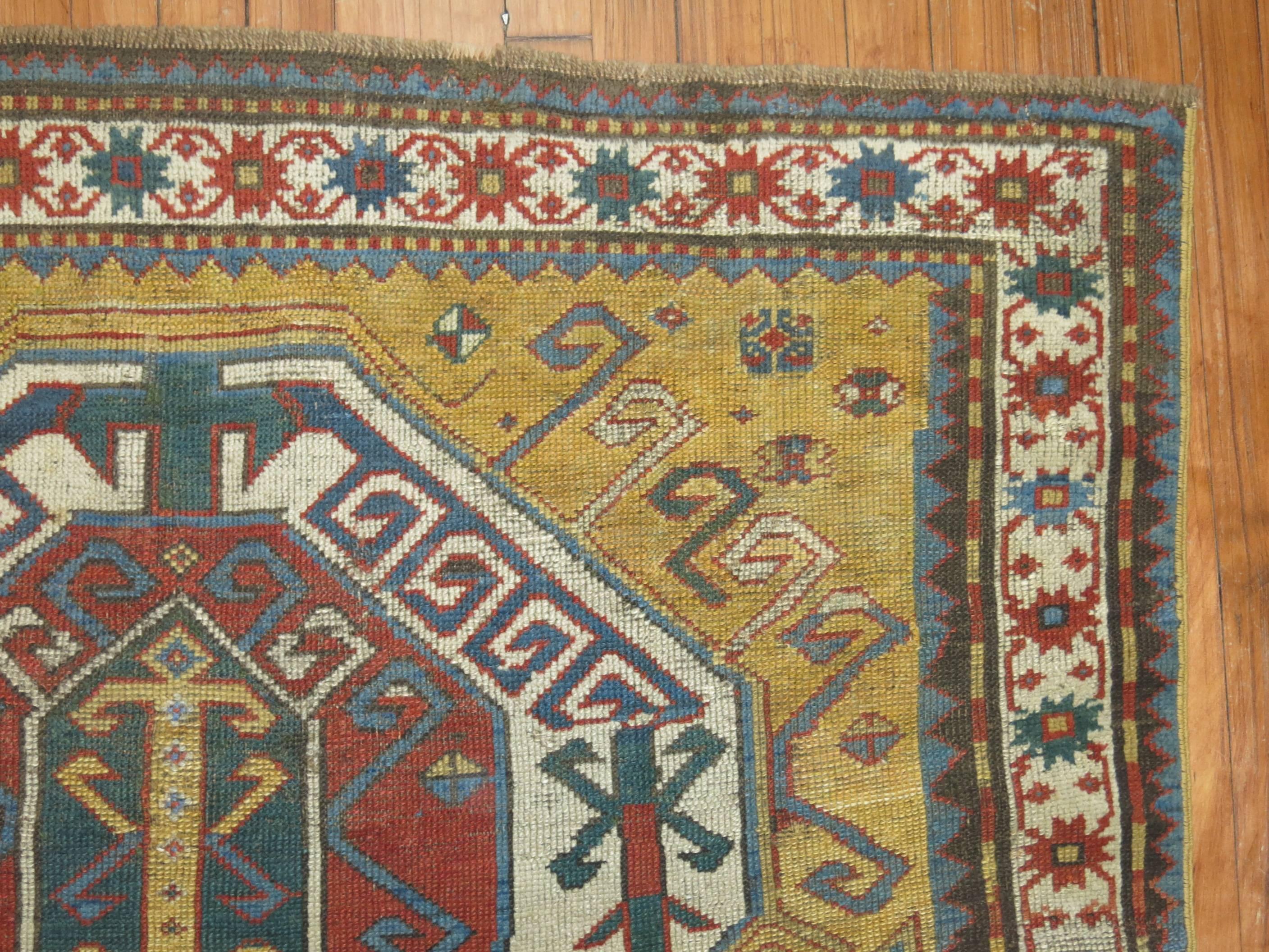 Hand-Knotted Yellow Antique Kazak Rug