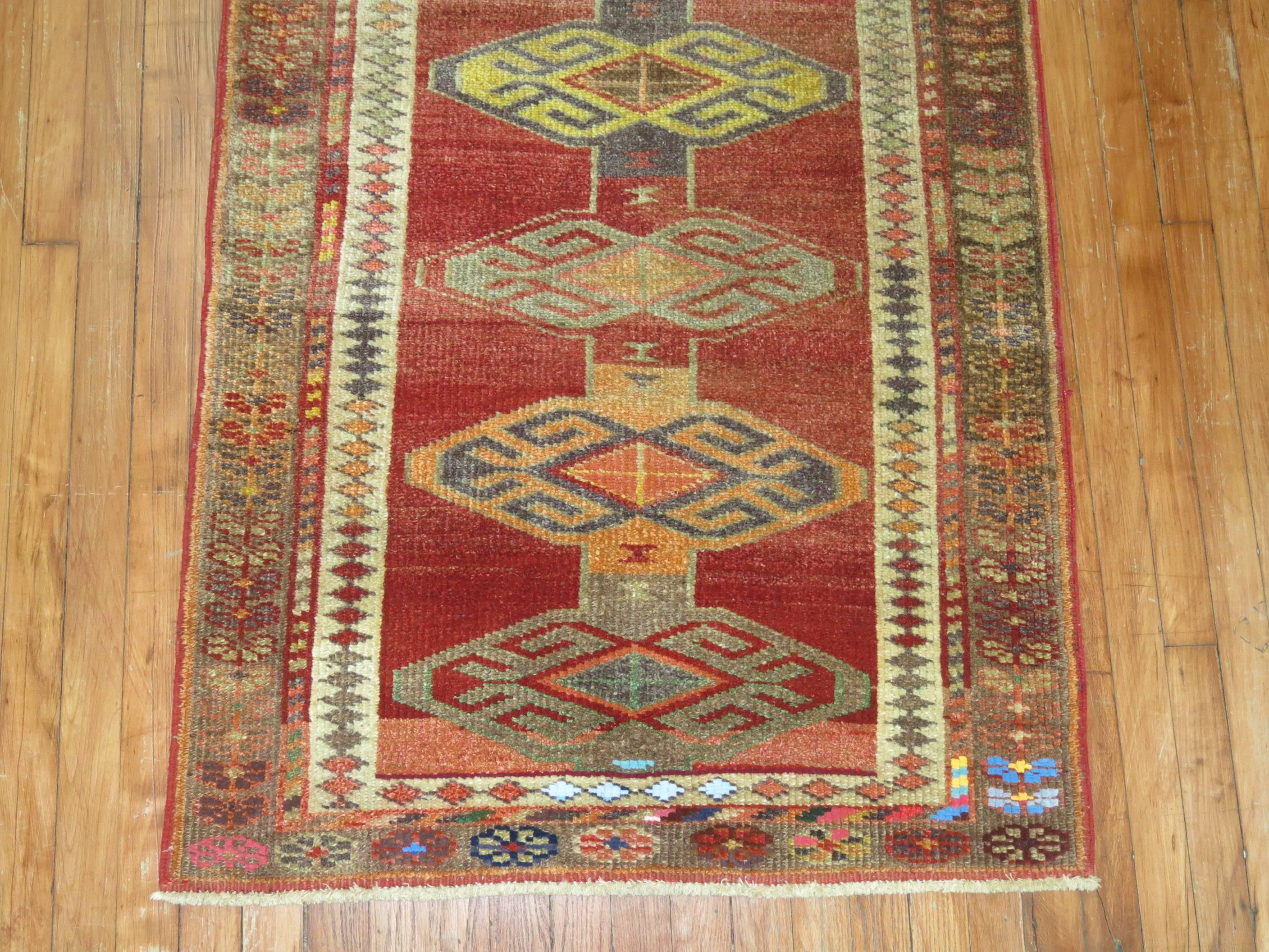 A colorful one-of-a-kind Armenian Runner from the 20th century.

2'11'' x 11'1''
