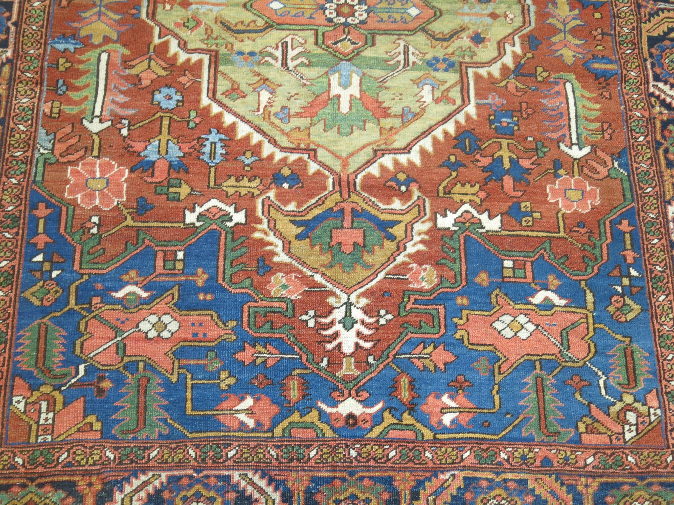 20th Century Antique Persian Heriz Green Medallion Carpet