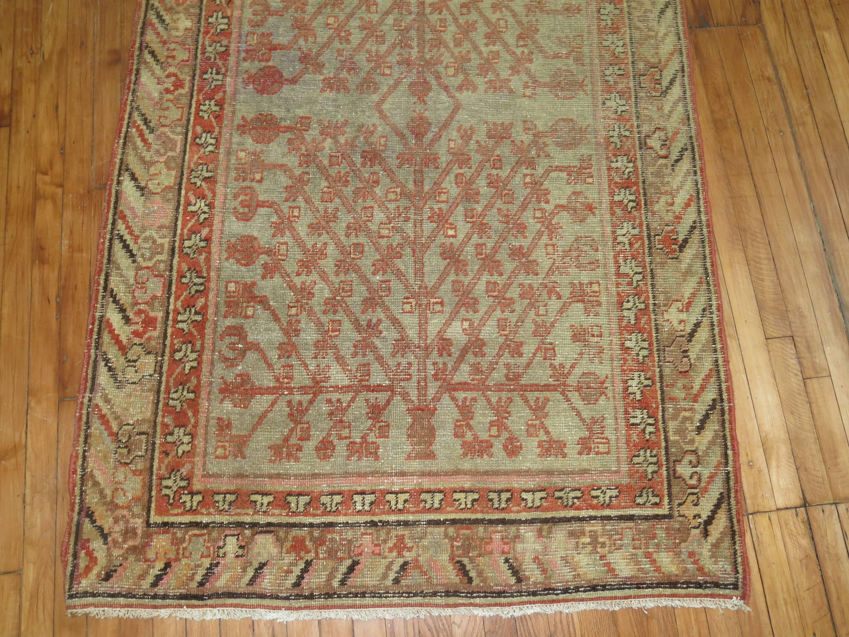 Worn Antique Khotan Area Size Rug In Fair Condition For Sale In New York, NY