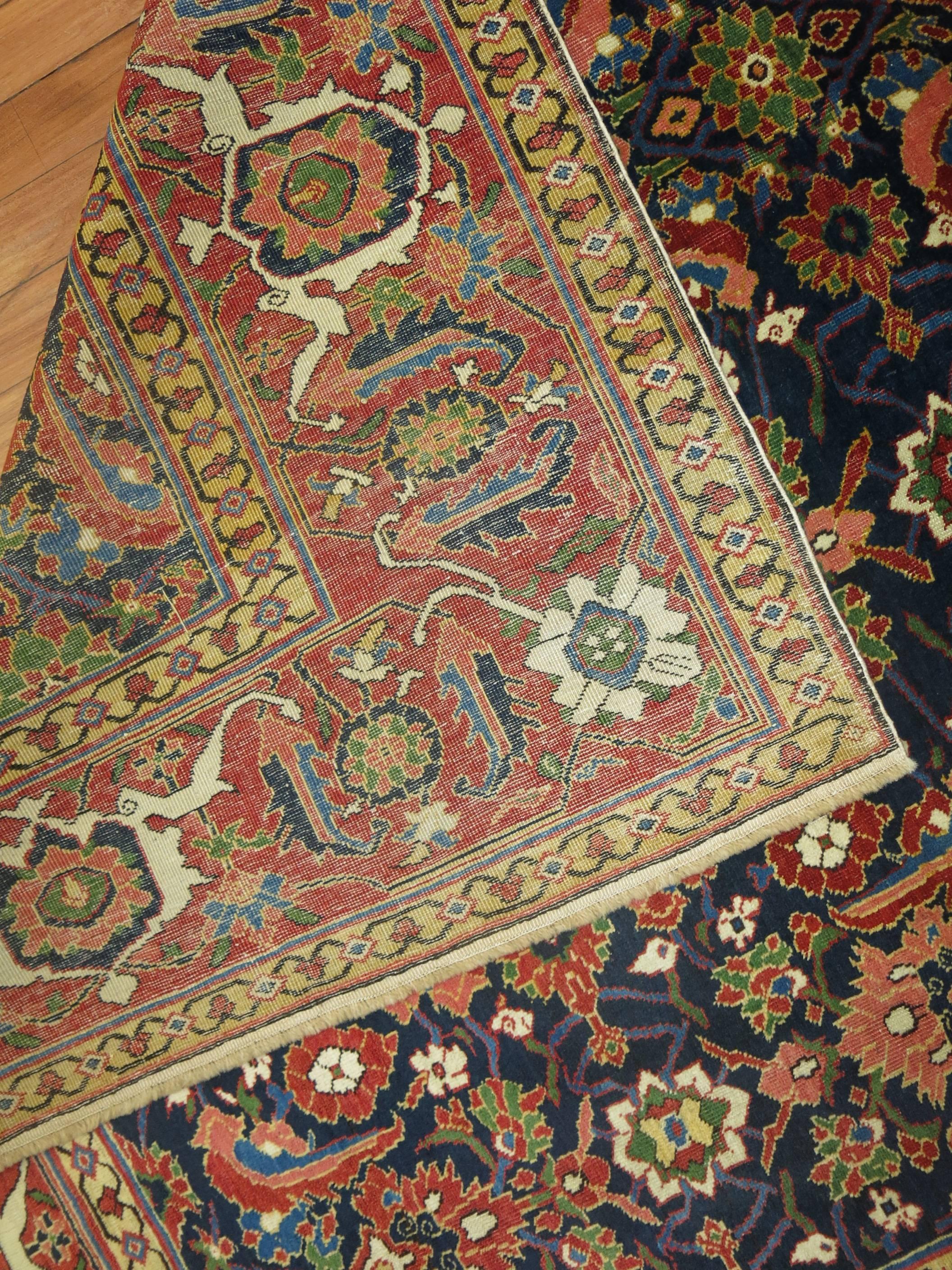 A connoisseur caliber late 19th century Caucasian Baku carpet. This piece does have some characteristics that you see in Persian rugs but we believe it was woven in the caucuses. Glowing navy blue, apple green, terracotta, rich reds and corals. The