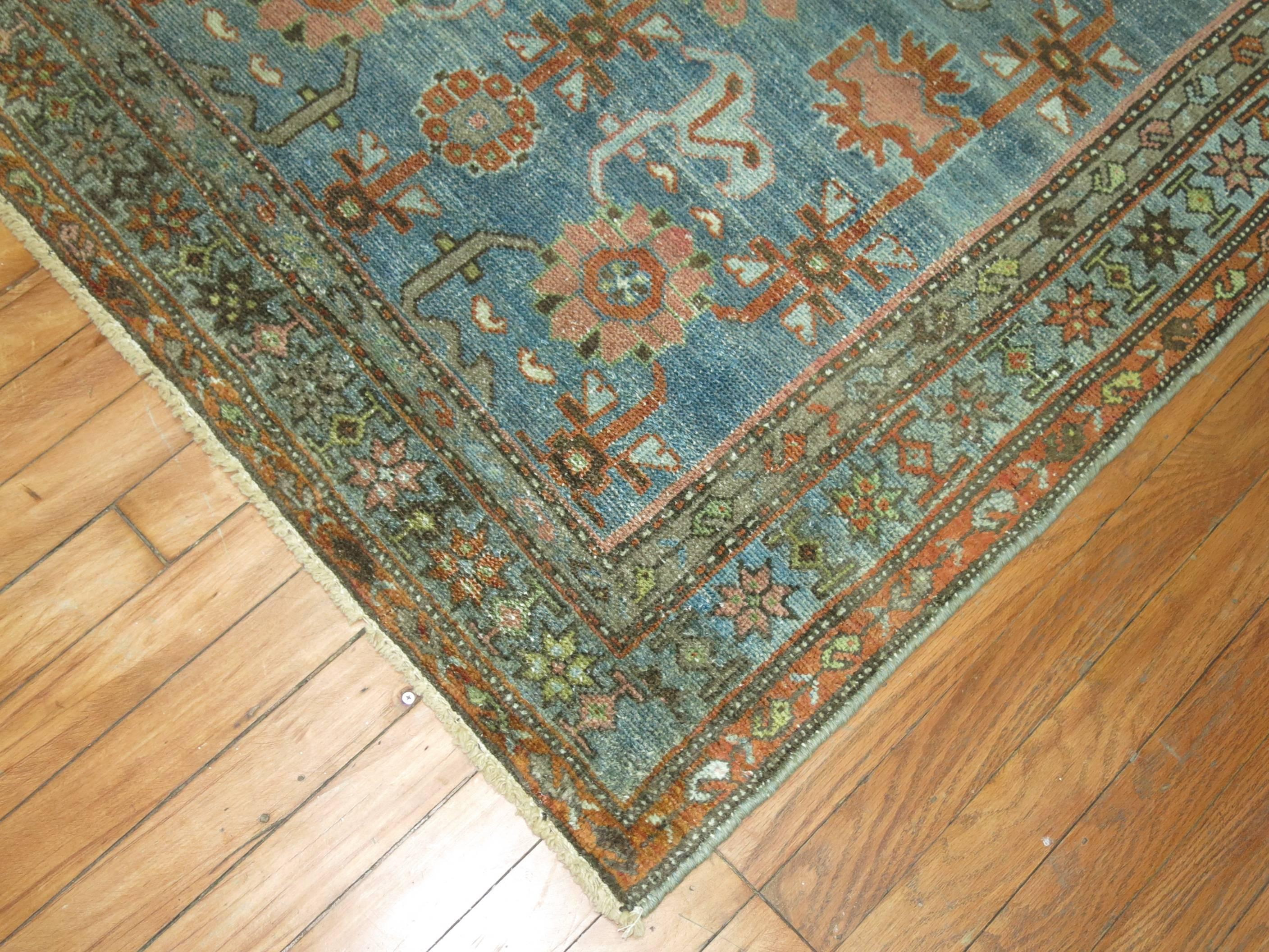 One of a kind Persian Malayer with abrashed blue field.