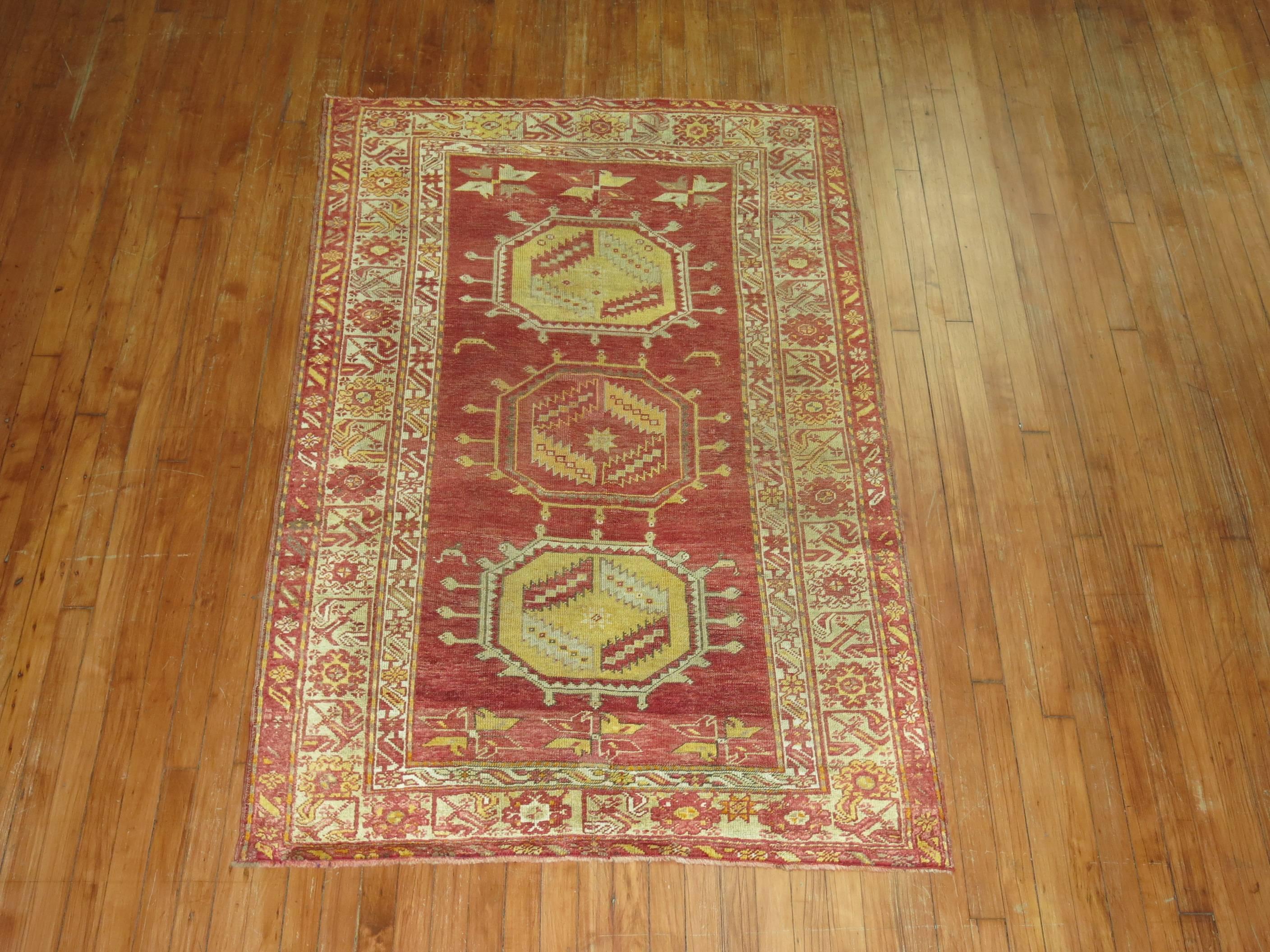 Antique Turkish Sivas rug in reds, brown, blues and mustard.

3'10'' x 6'