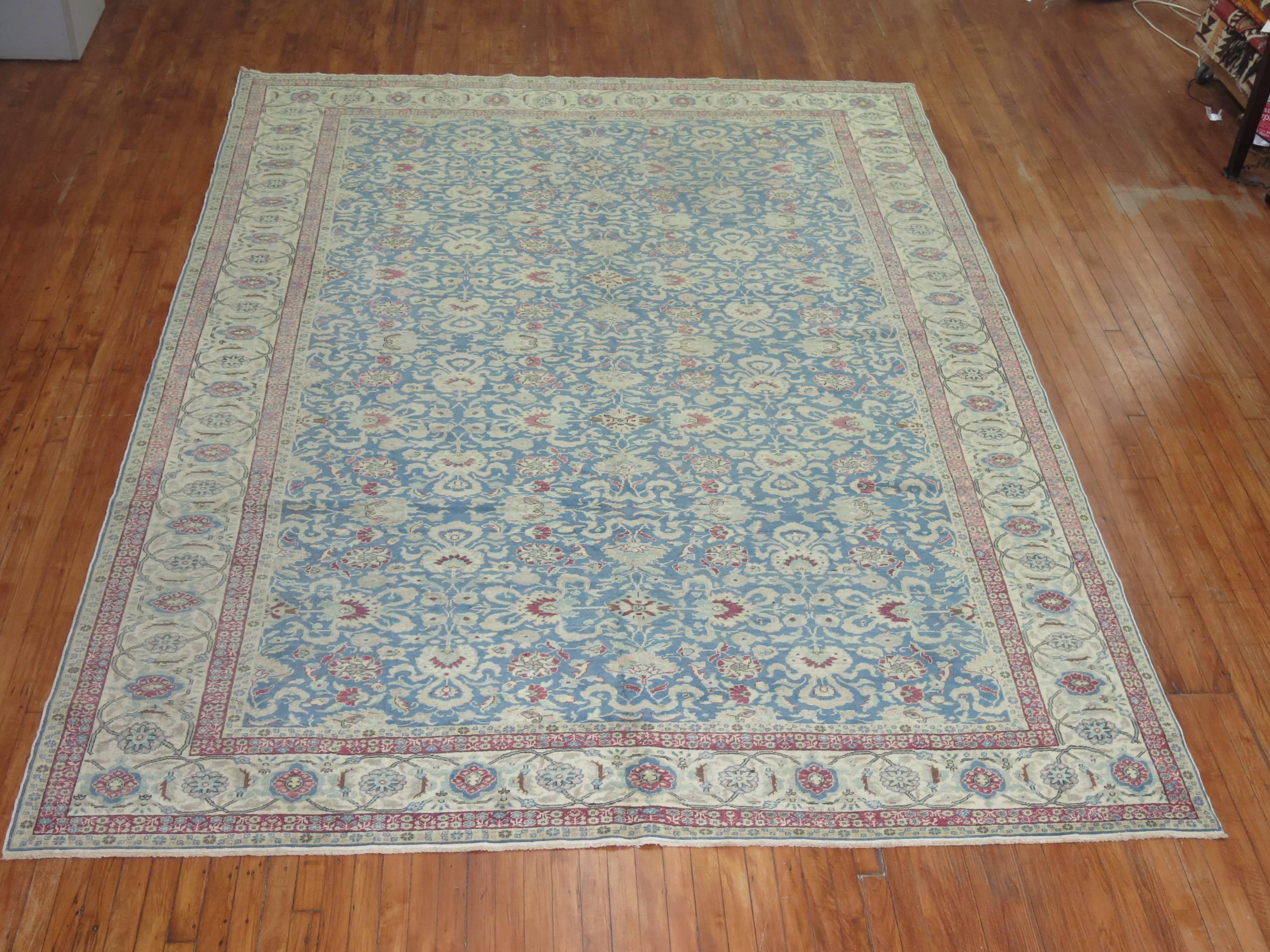 Turkish Sivas carpet with an all-over blue motif rug and ivory border.