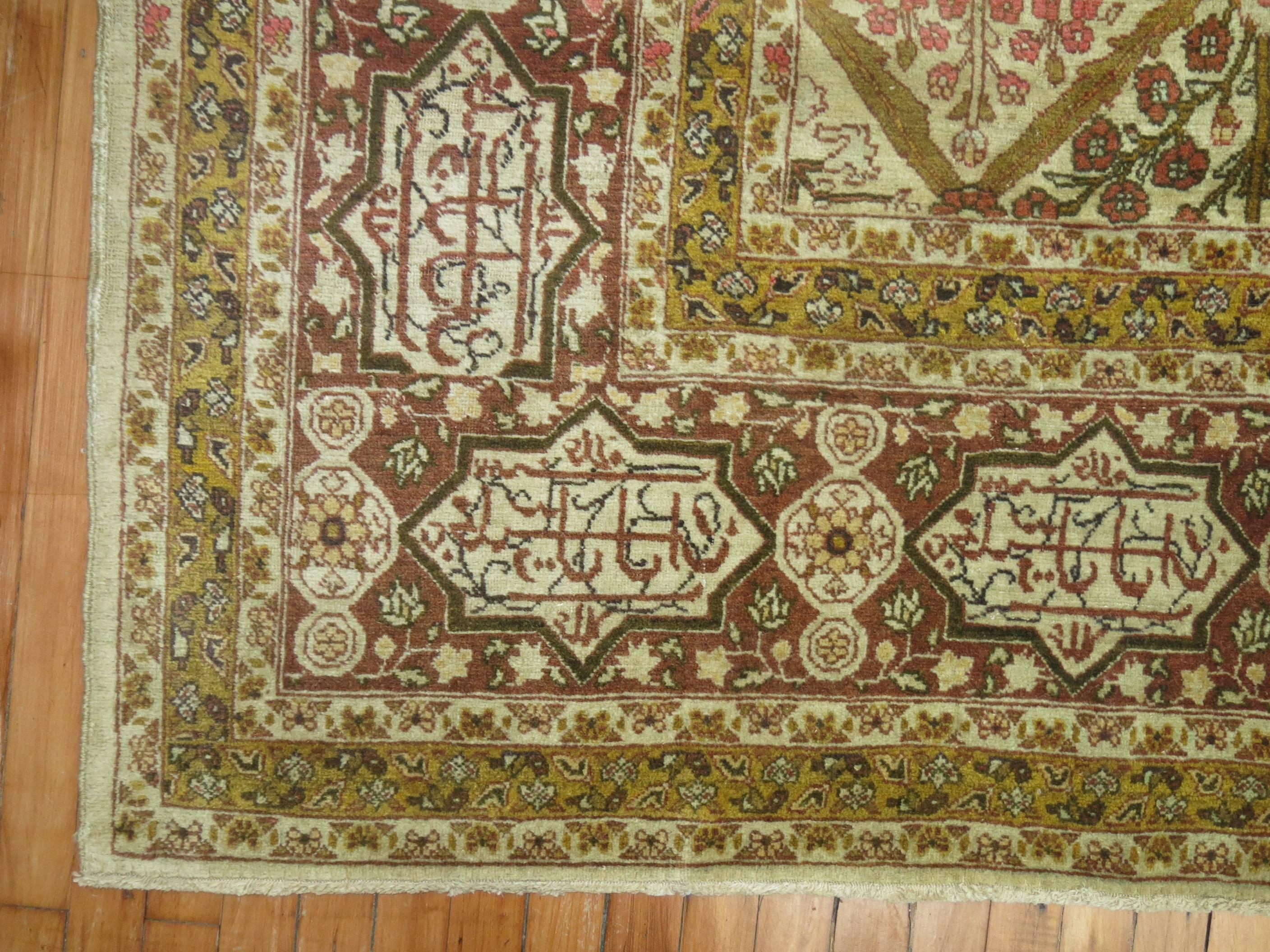 An early 20th century Persian Tabriz carpet with a garden design typically seen in persian bakhtiari carpets. The border has a Persian love poem in-scripted too. The weaver was quite an artisan.

Measures: 8'8'' x 12'1''.