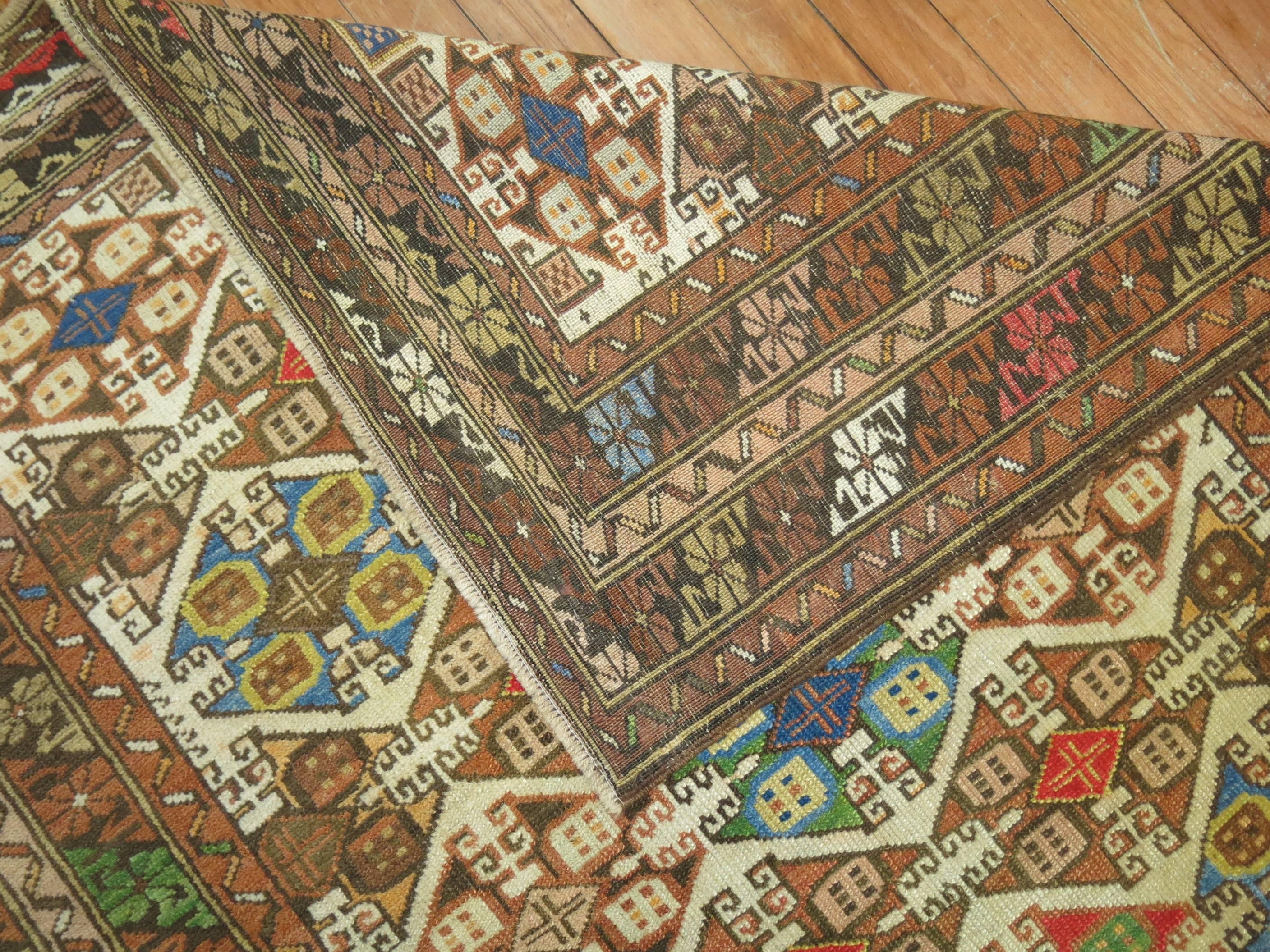 Antique Caucasian rug with a dazzling color combination.

3'6'' x 4'8''