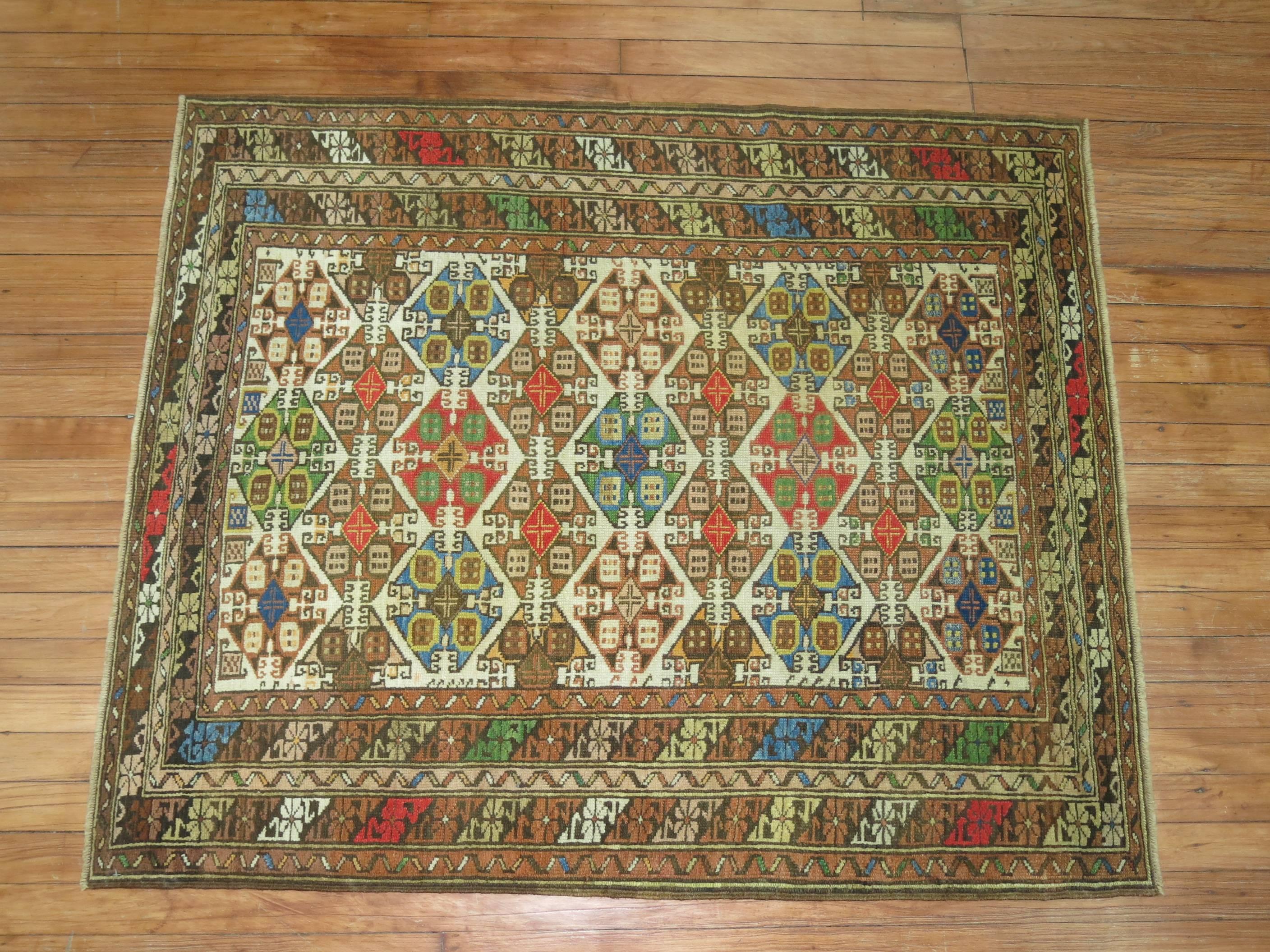 Kazak Zabihi Collection Colorful Antique Caucasian Rug For Sale
