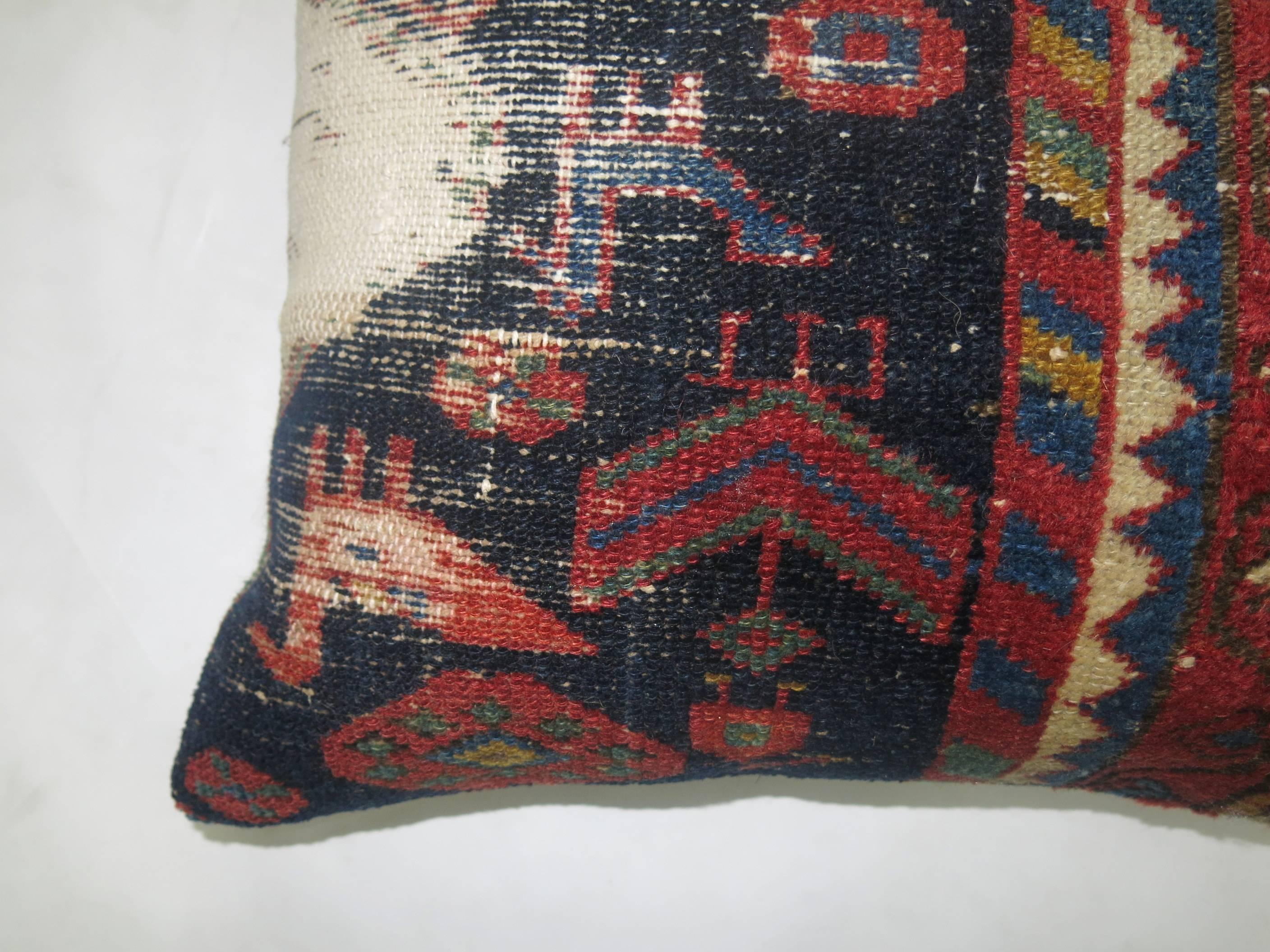 Shabby Chic Persian pillow in blues, orangy red.

16'' x 23''