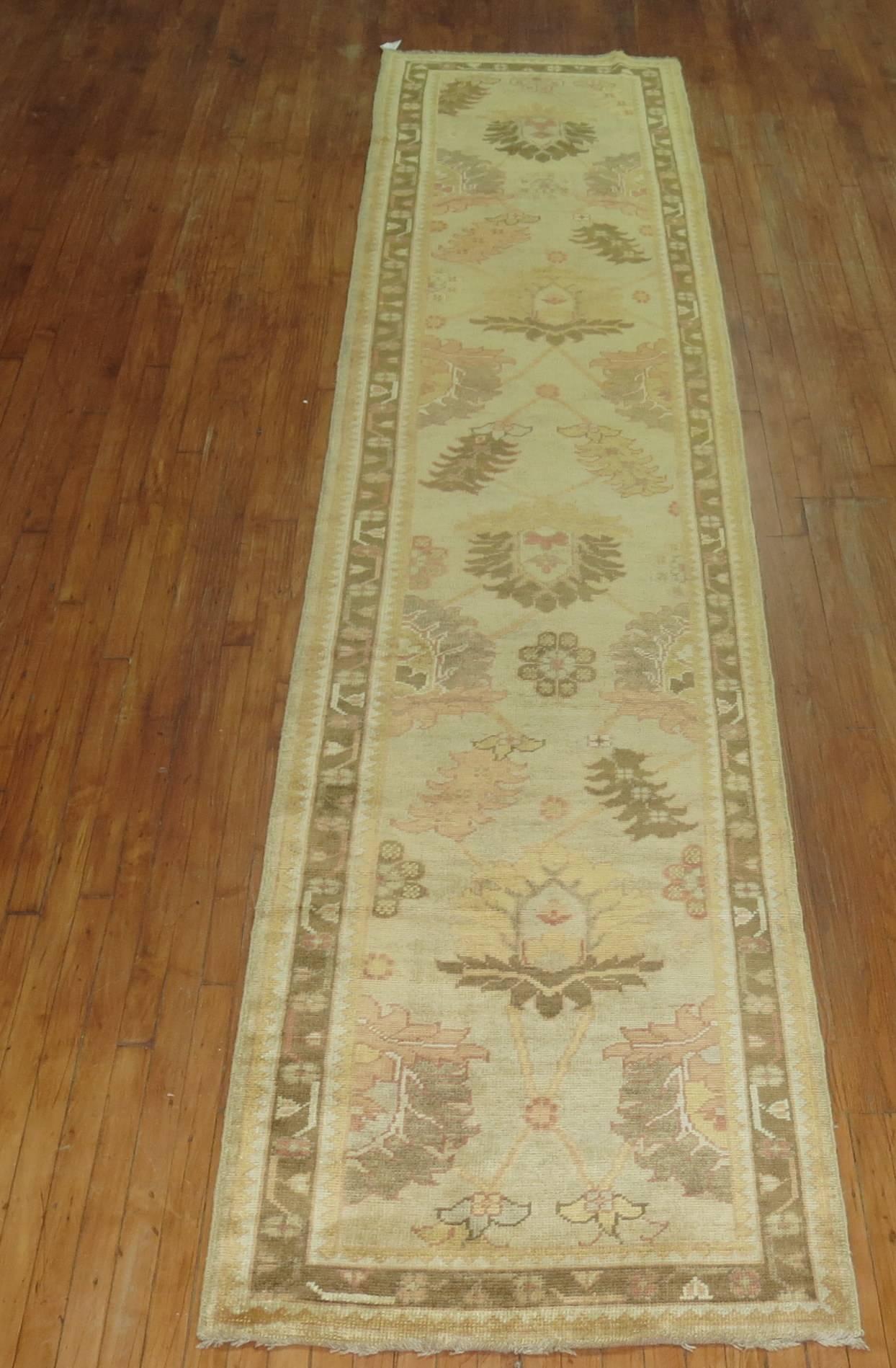 Turn of the 21st century Turkish Oushak runner predominantly khaki and brown. Handmade with recycled vegetable dyed wool used in mid-20th century Turkish Oushak rugs.

Measures: 3'1'' x 15'2''.