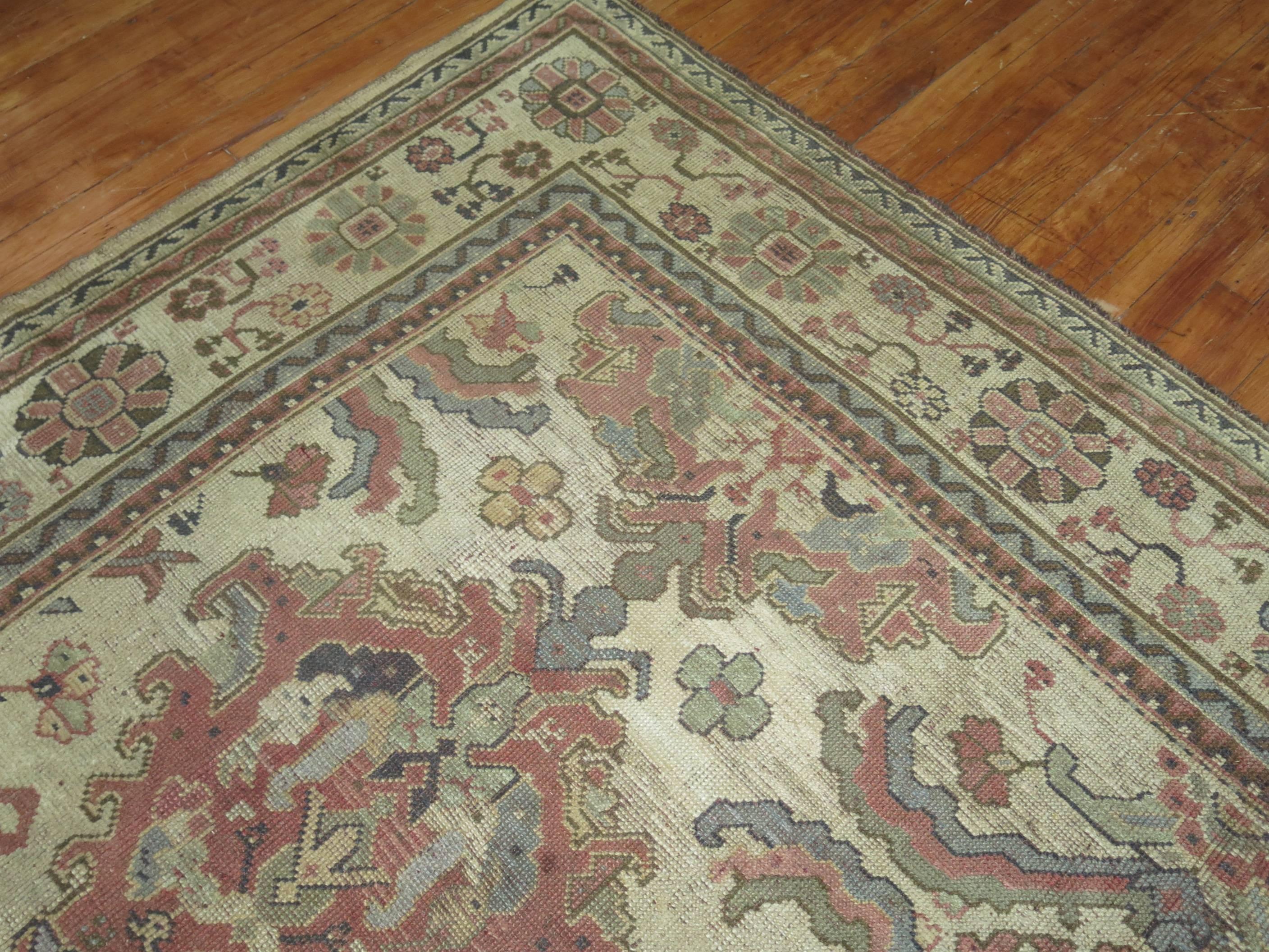 Casual looking Squarish size Turkish Oushak rug with an all-over design.
