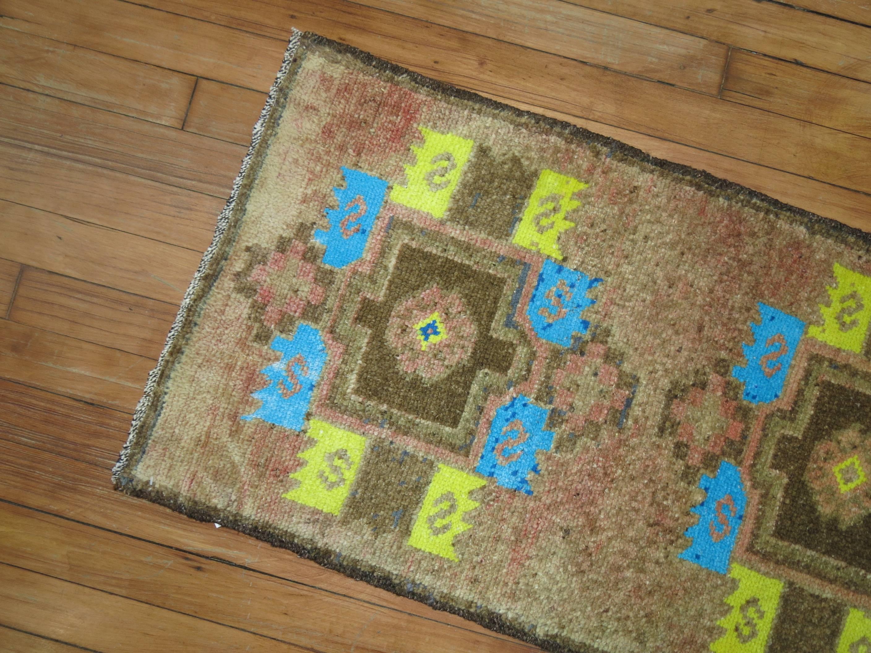 Electric blue and yellow-green cotton-colored accents highlight this fascinating vintage Turkish rug we have in our collection.

1'7'' x 3'2''