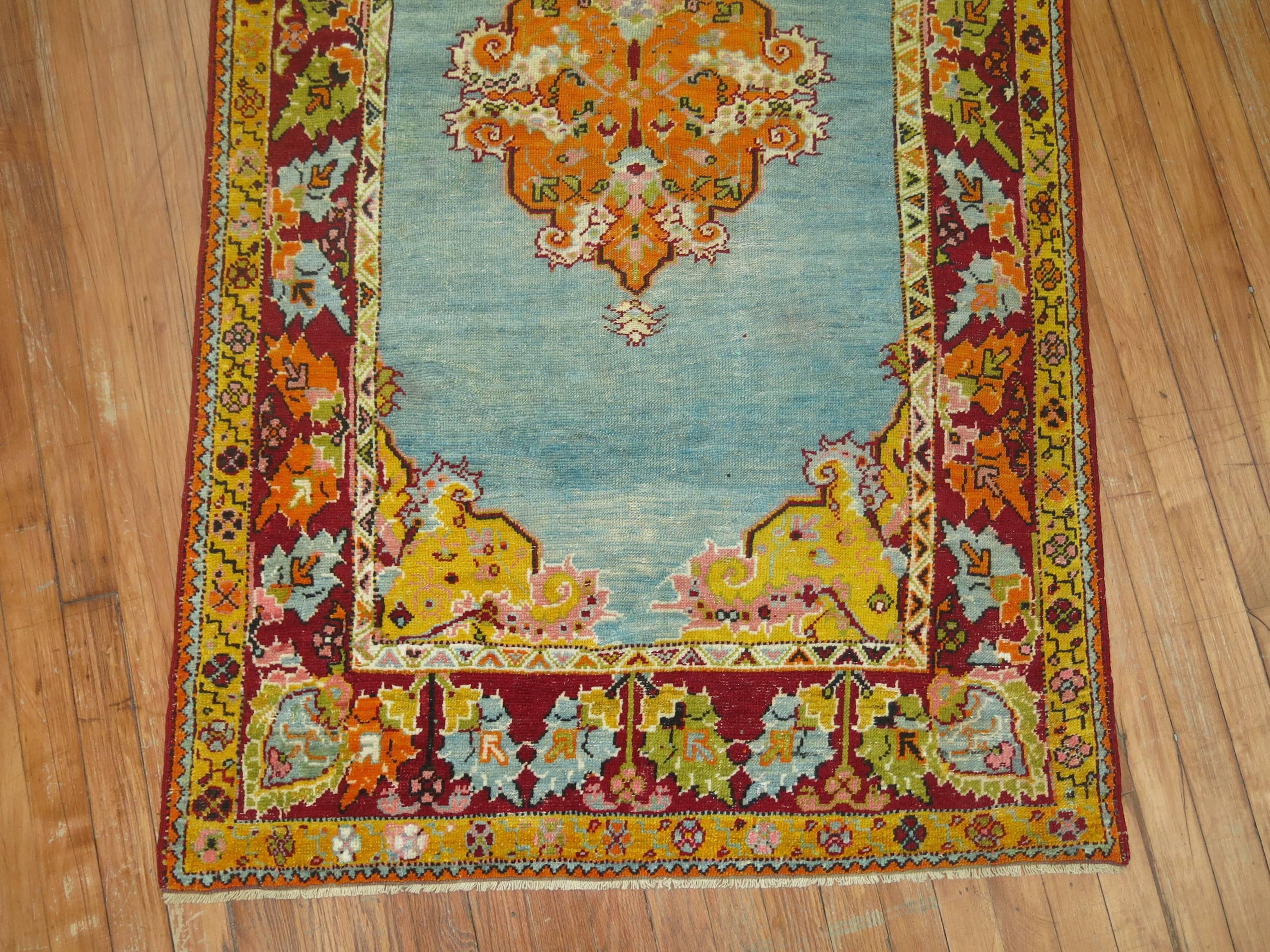 Superfluous antique Turkish Melas rug featuring a bright electric blue background. It was offered to us by a penthouse owner in a prominent hotel located in the heart of Istanbul,

circa 1930, measures: 3'2
