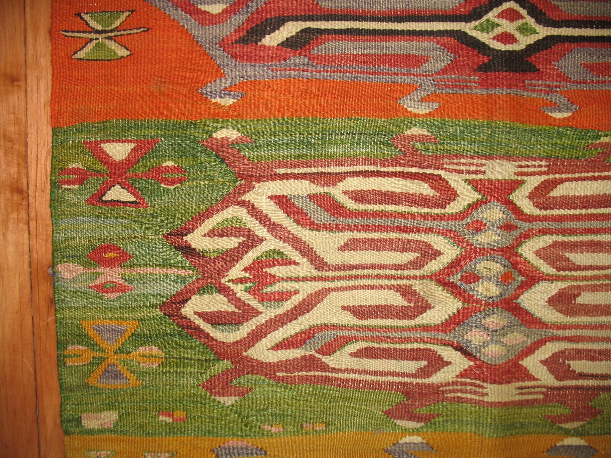 Colorful Turkish Kilim throw size scatter piece.