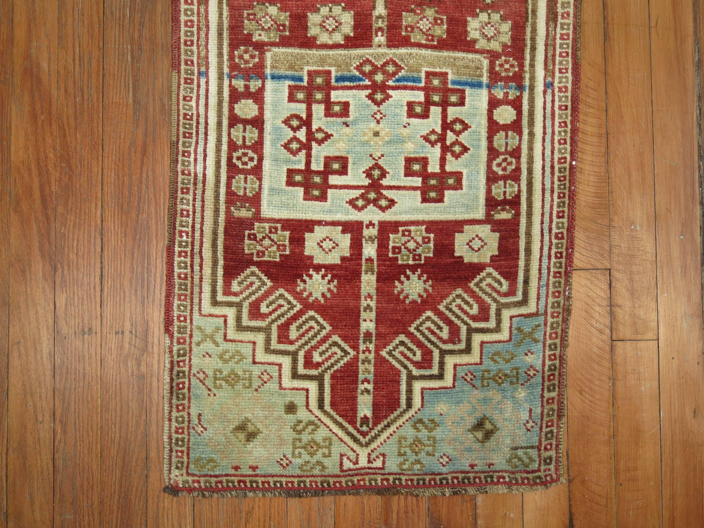 Geometric Turkish anatolian rug in quirky colors.