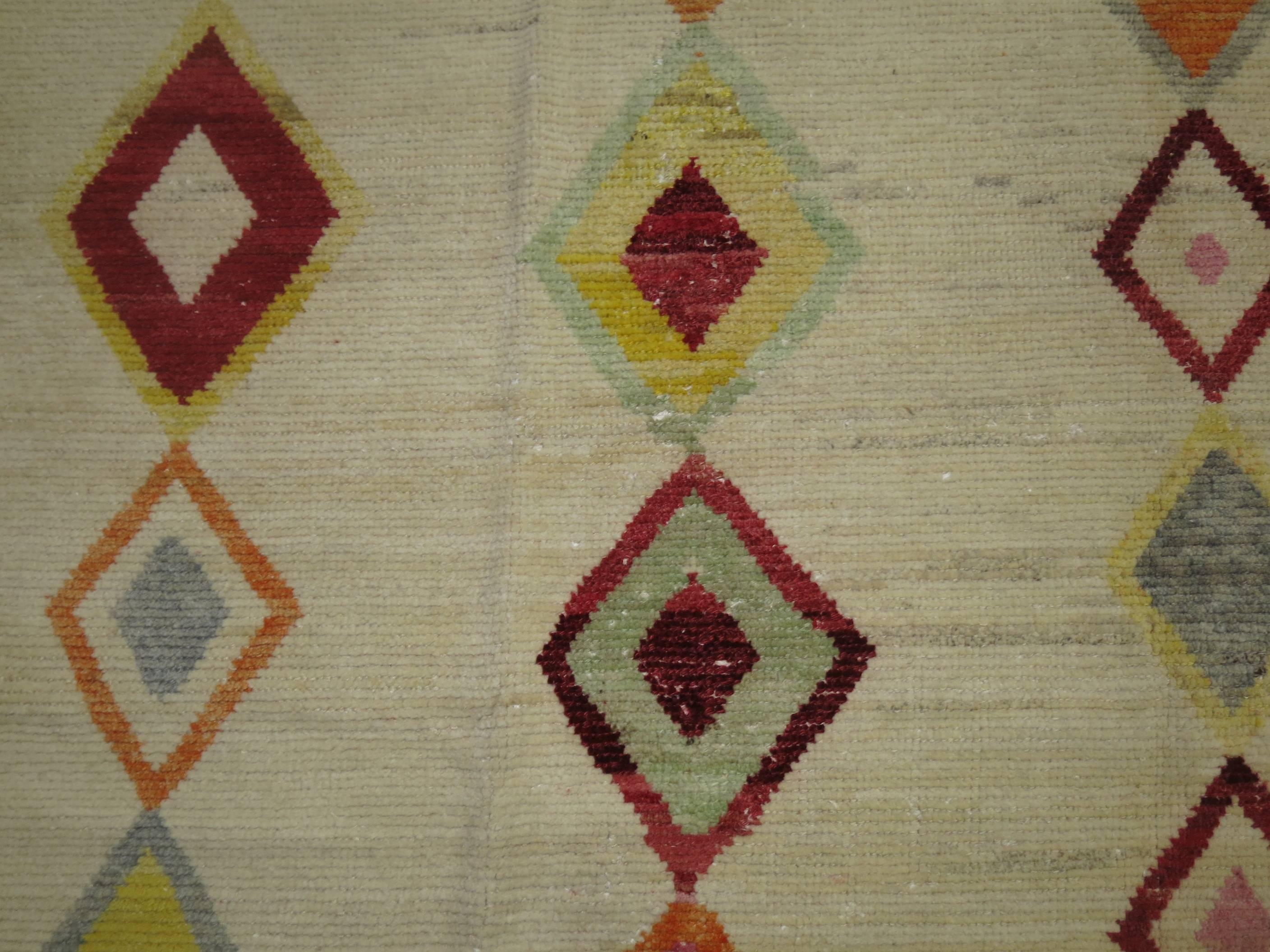 One of a Kind room size Turkish Tulu rug handwoven with re-cycled wool derived from vintage Turkish carpets.
