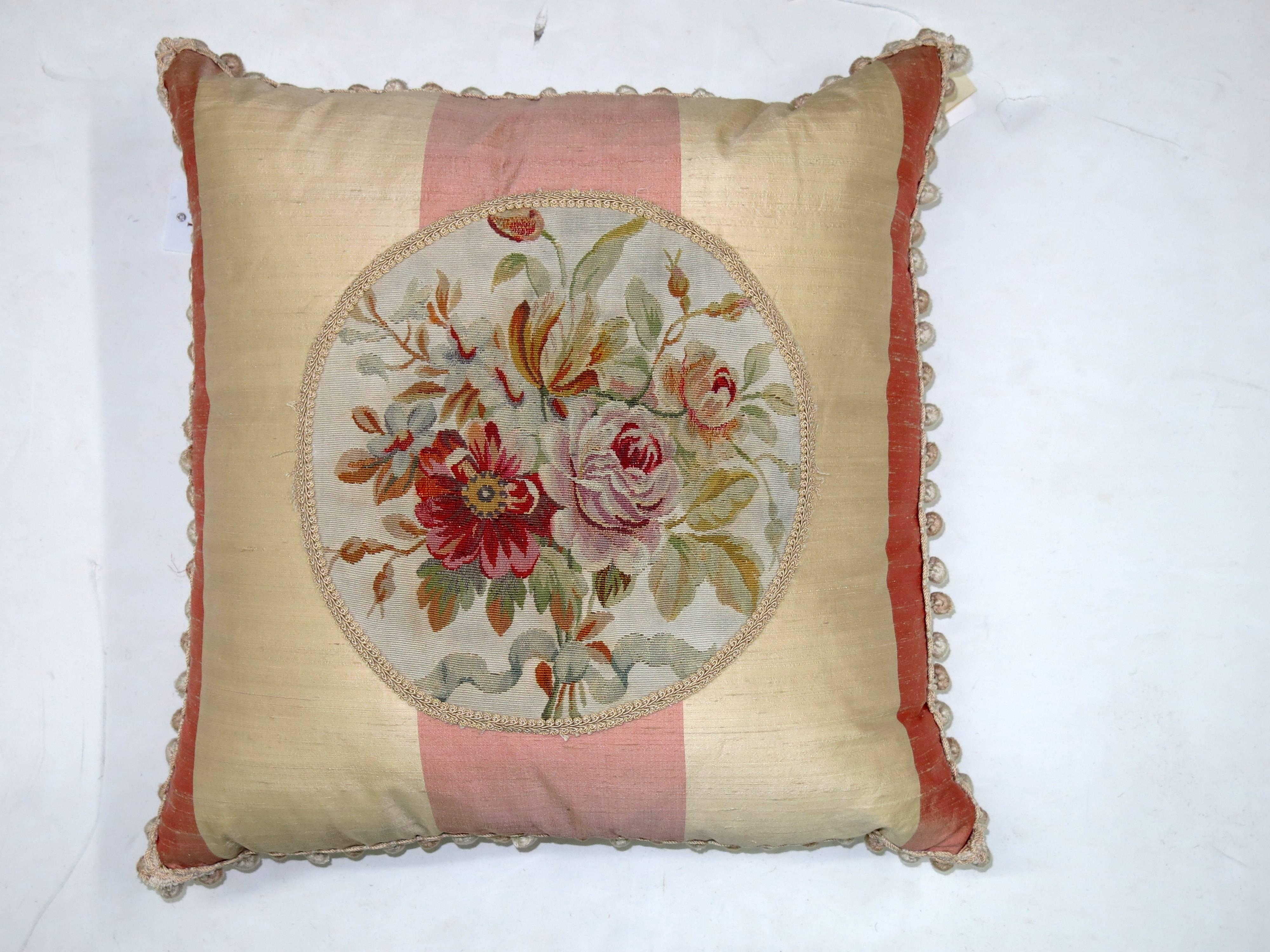 Pair of silk inlay French Aubusson pillows with tassled sides and ends. Each are sewn shut measuring 24'' x 24''.