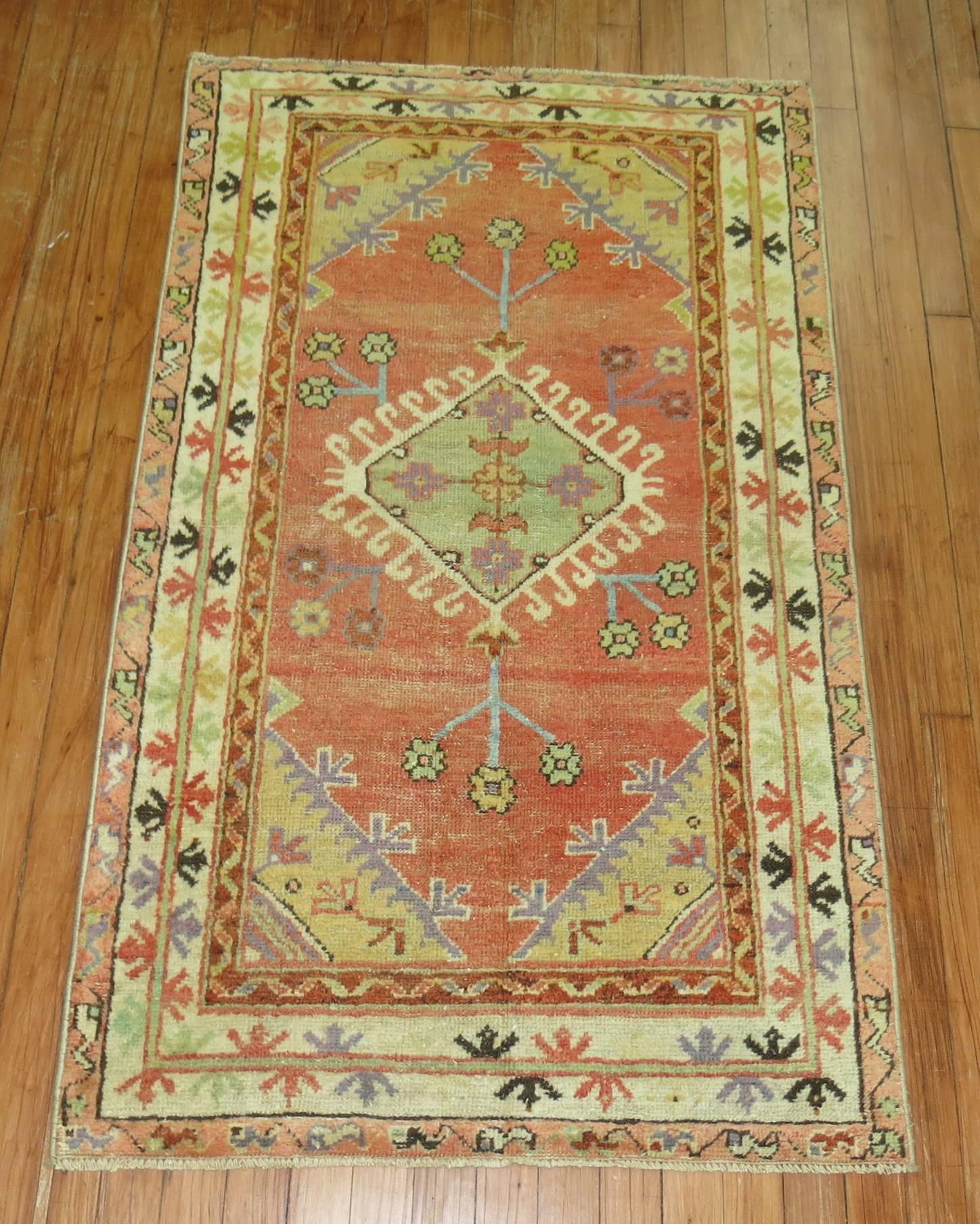 Colorful vintage Turkish Oushak throw rug.