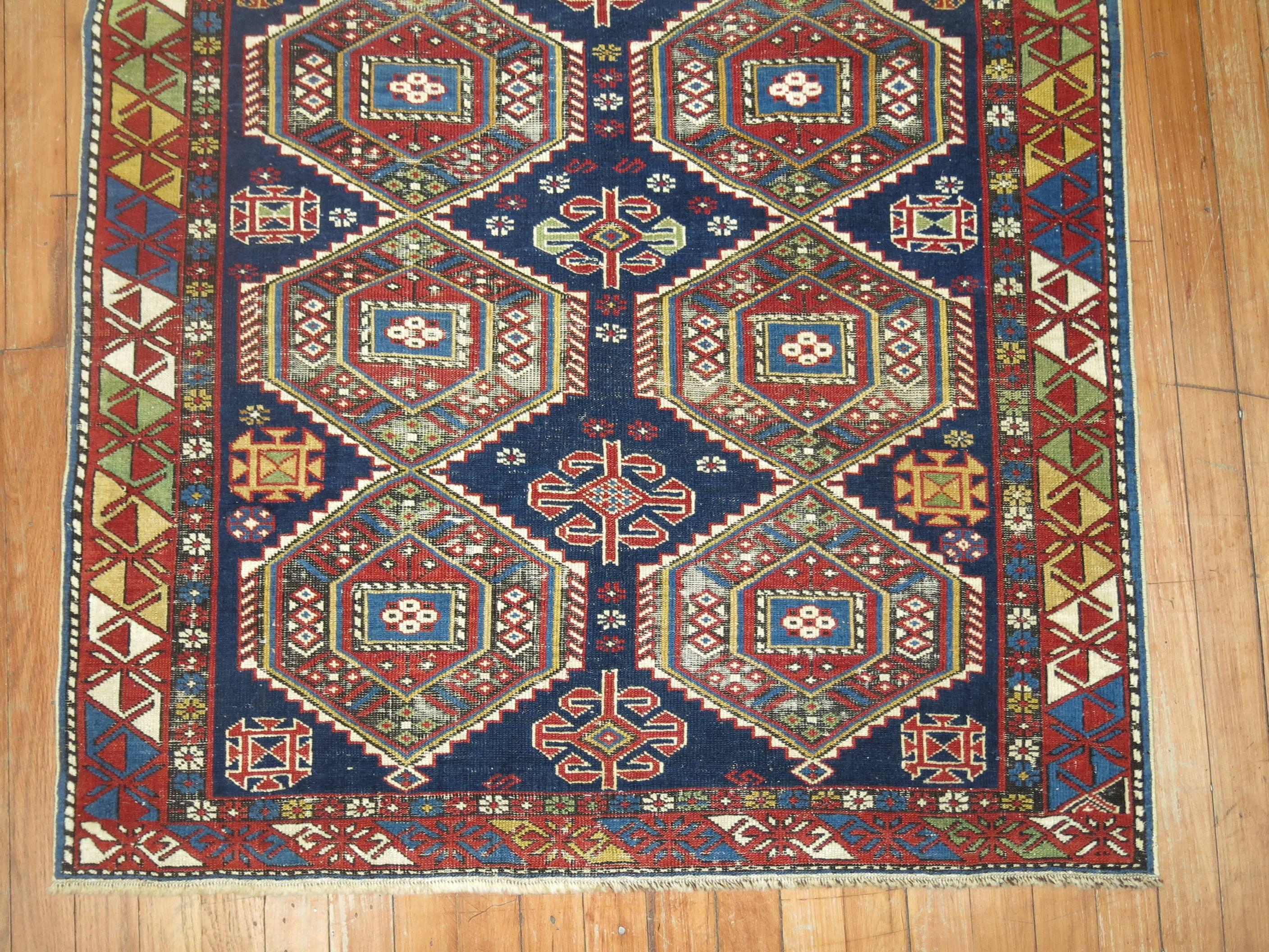 An early 20th century finely wove, jewel toned antique Shirvan rug from the Caucasus.

3'4'' x 5'2''