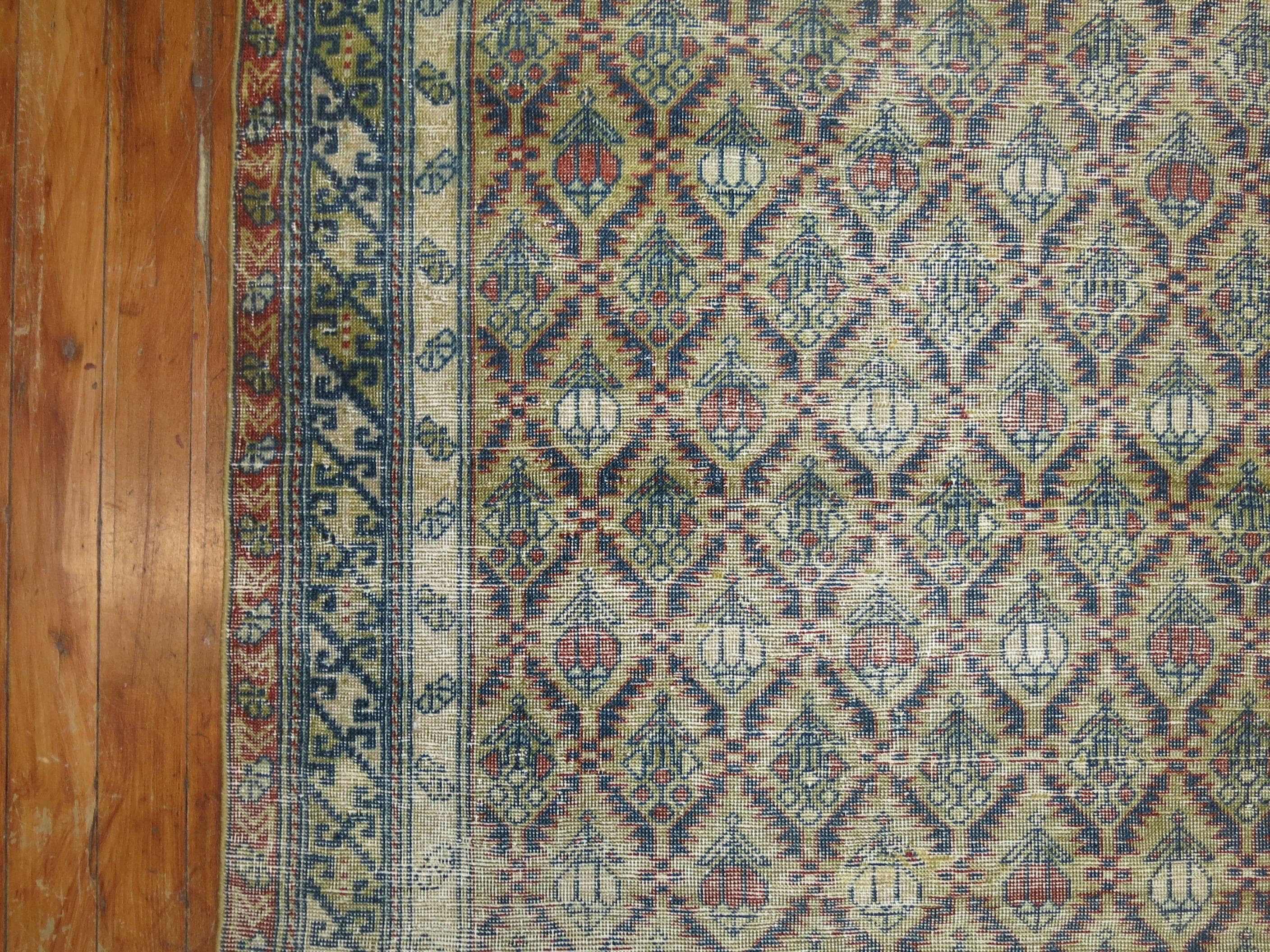 Wool Antique Distressed Caucasian Rug For Sale