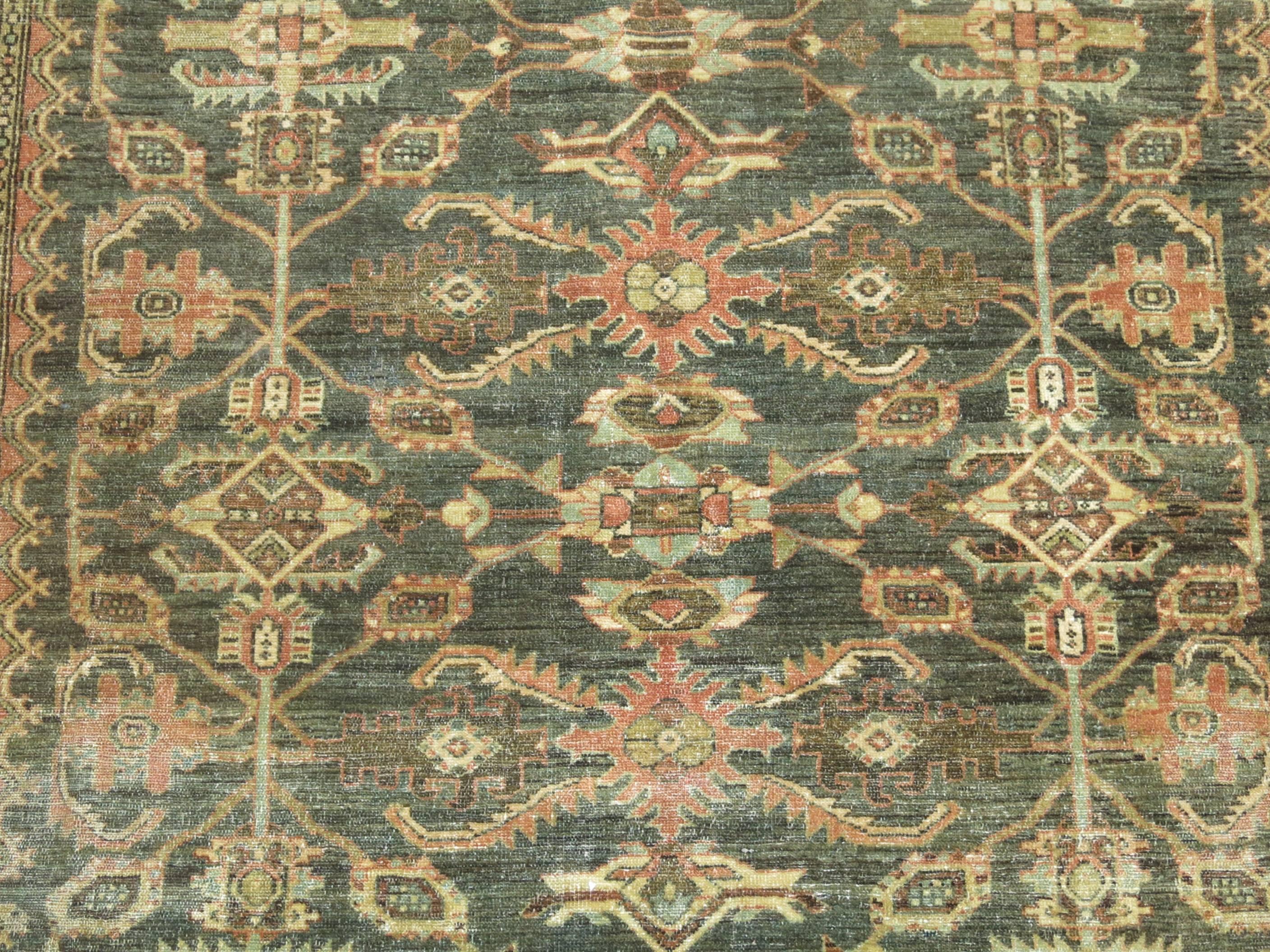 An early 20th century rare size Persian Malayer rug in sea foam hues.

5'5'' x 6'3''