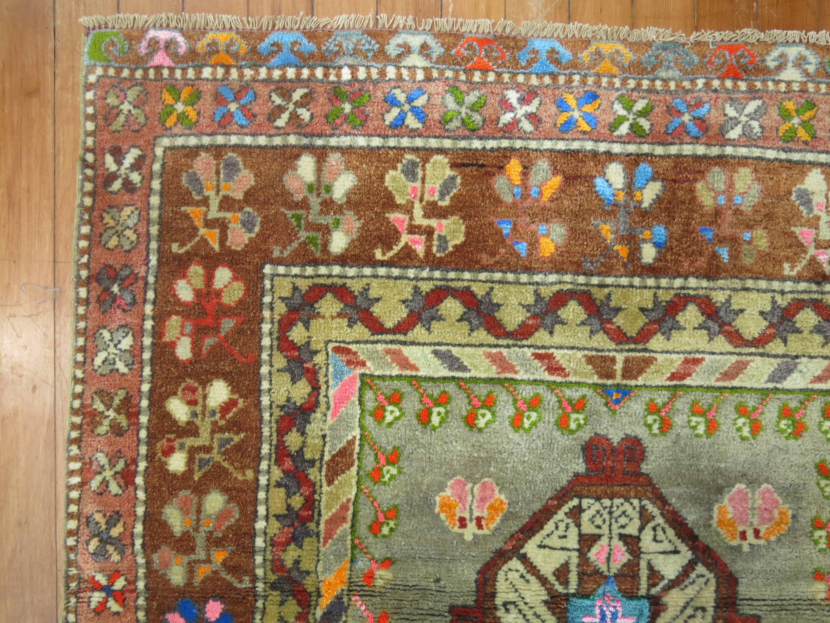 Eclectic best describes this colorful Turkish Anatolian rug.
