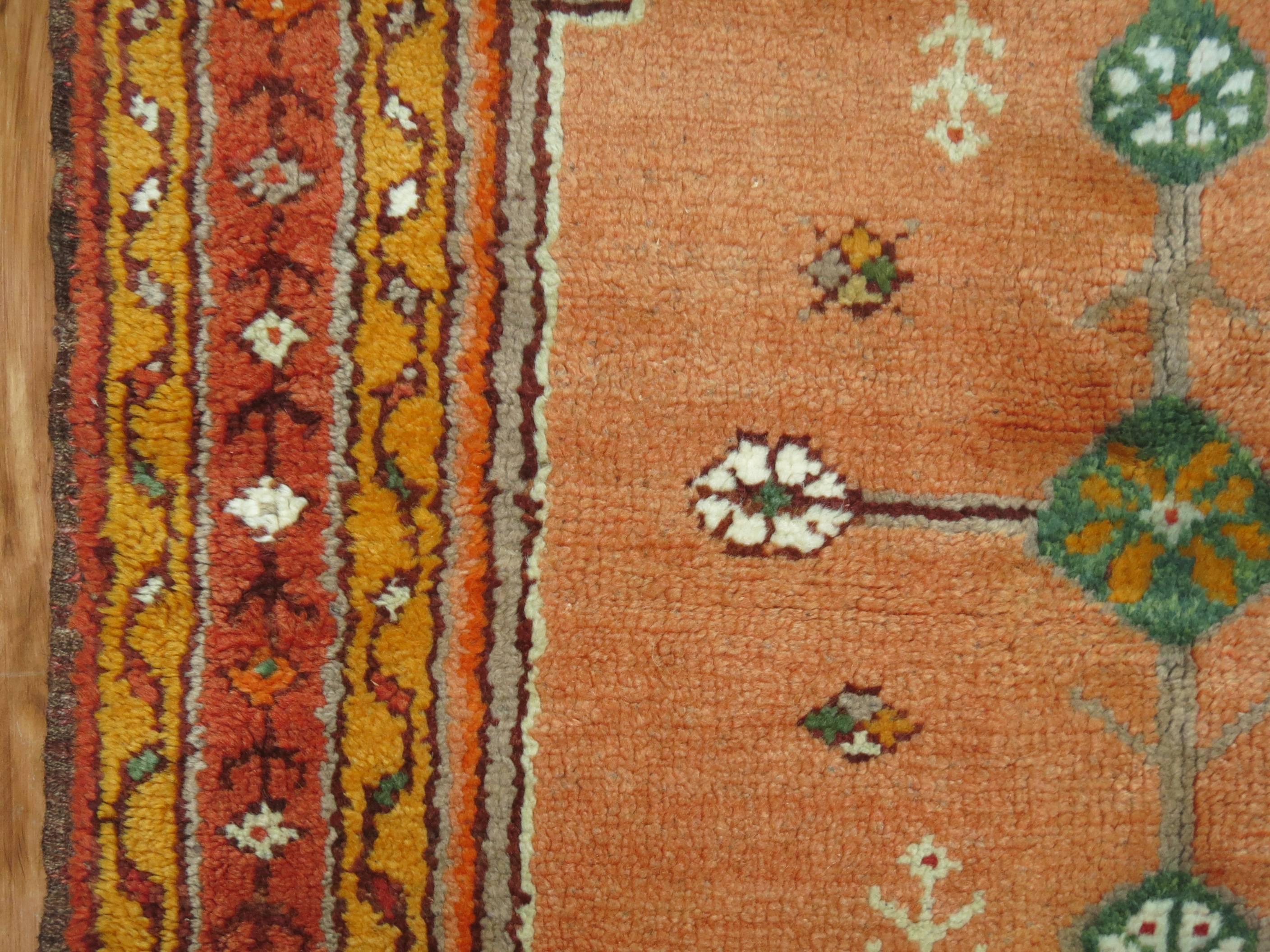 A unique early 20th century antique Turkish Oushak scatter size rug in full pile condition. Orange, gold and teal accents, circa 1920.

Size: 3'6