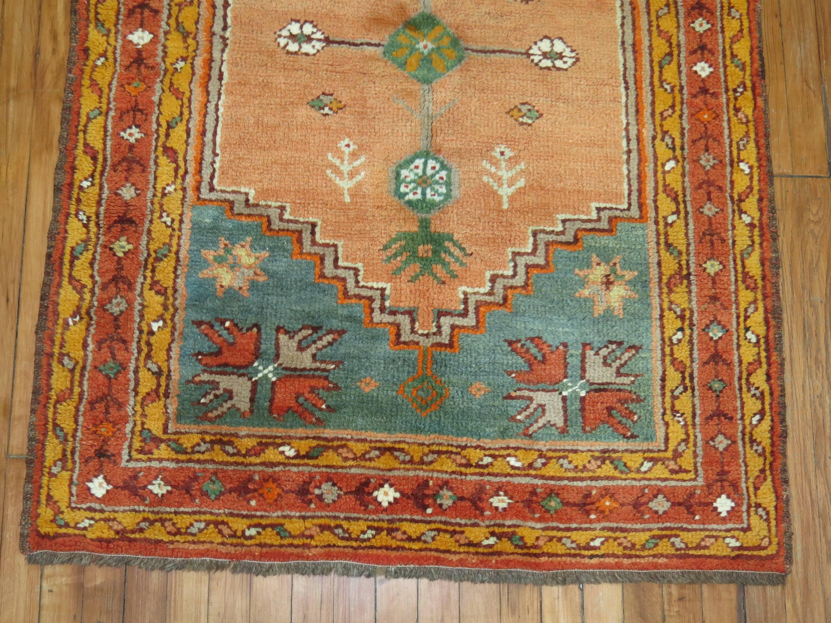 orange and teal rug