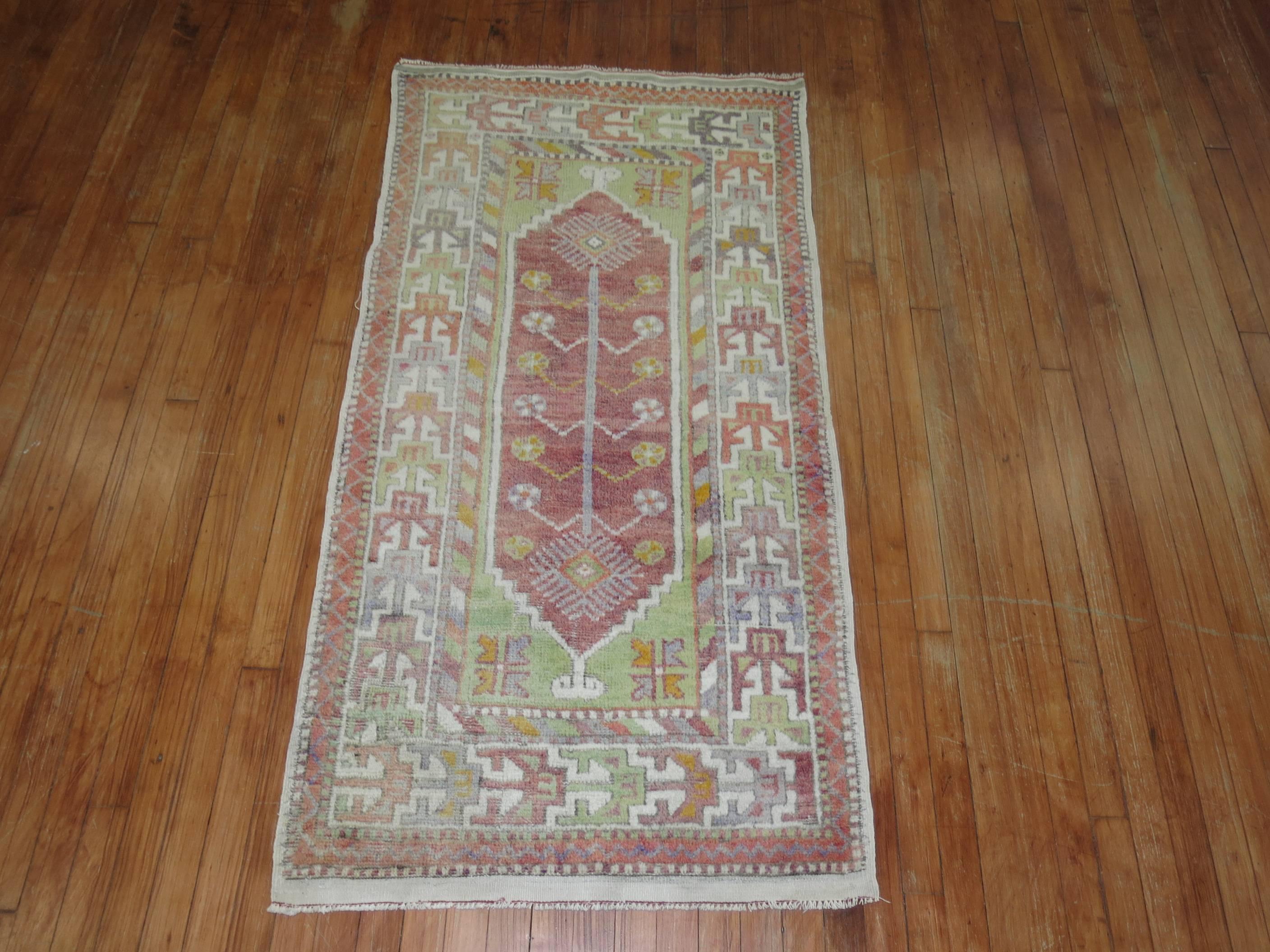 Attractive Turkish Anatolian rug with warm colors.
