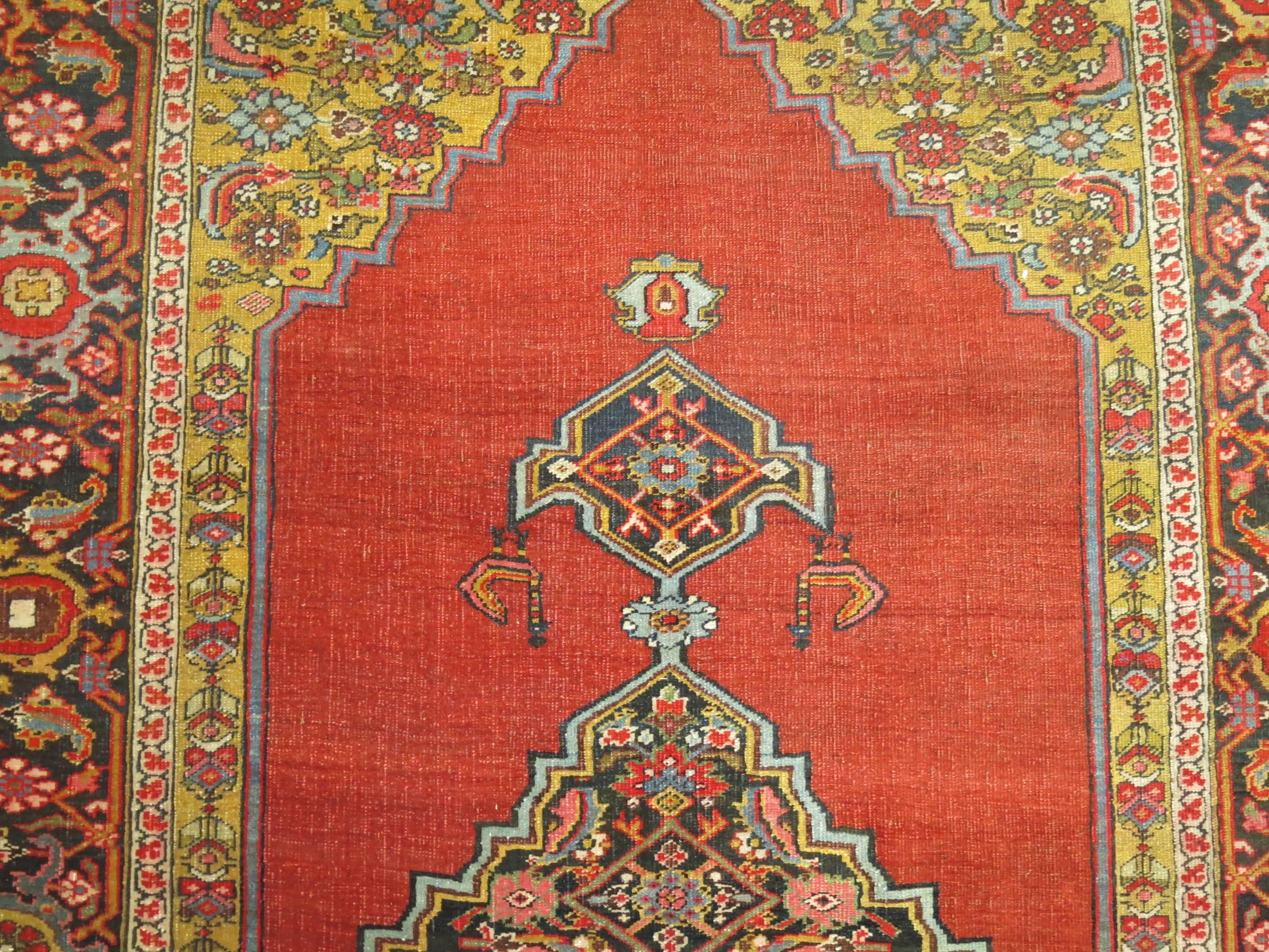 Jewel toned antique Persian Bidjar gallery size rug.

Bidjar carpets are world renowned for their superb artistry, craftsmanship, and excellent material, and can be distinguished by their heavy wool foundation. As the weaver tied each row of