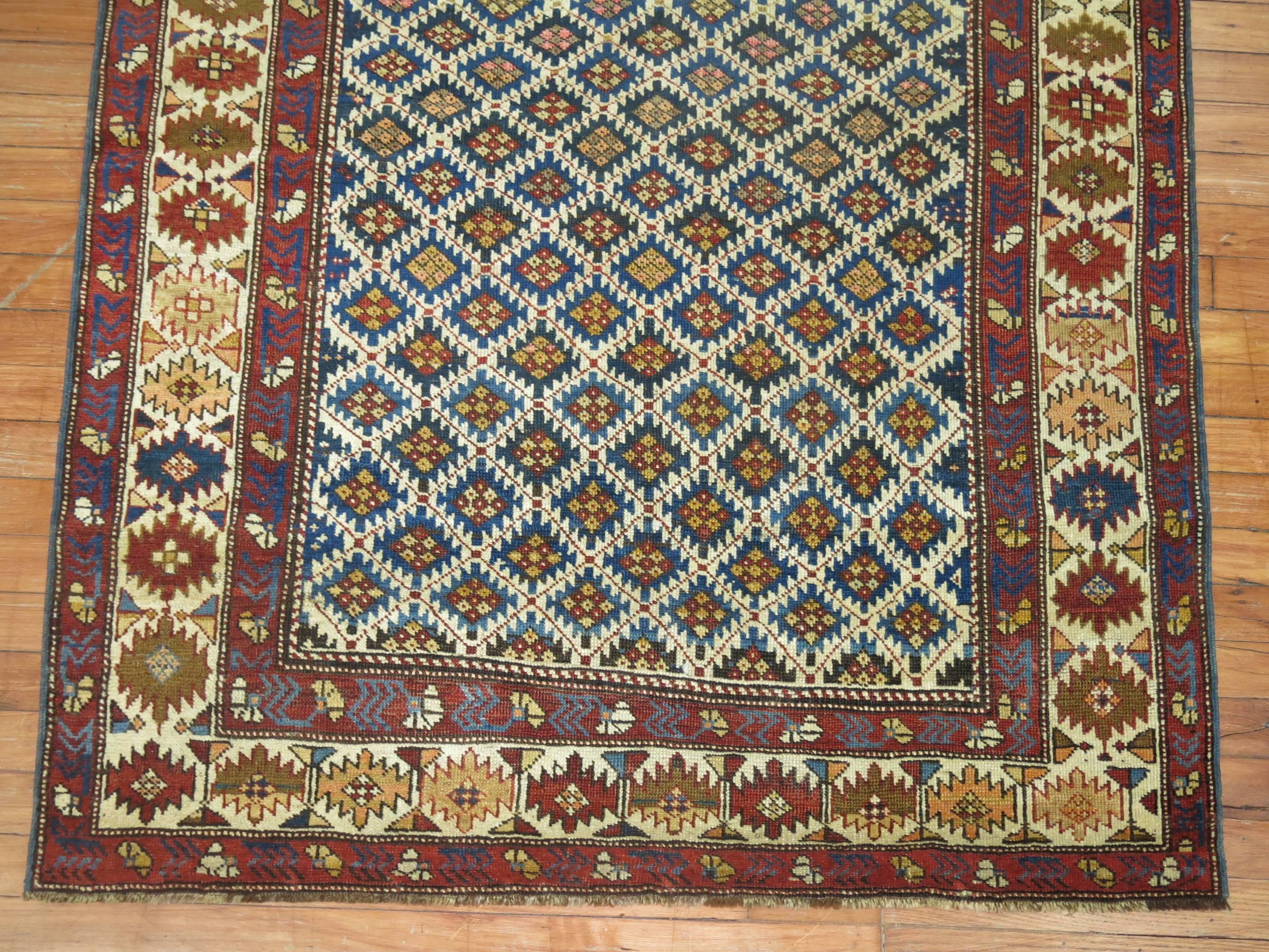 An early 20th century decorative Caucasian rug.