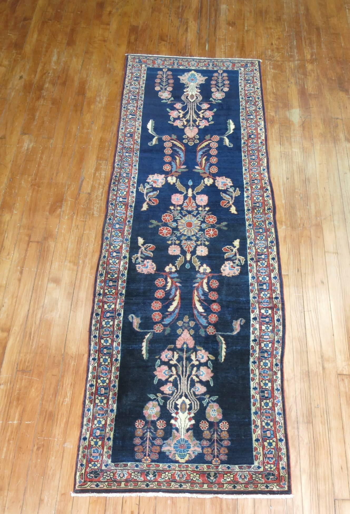 Super fine quality rare size early 20th century jewel toned Persian Sarouk runner.