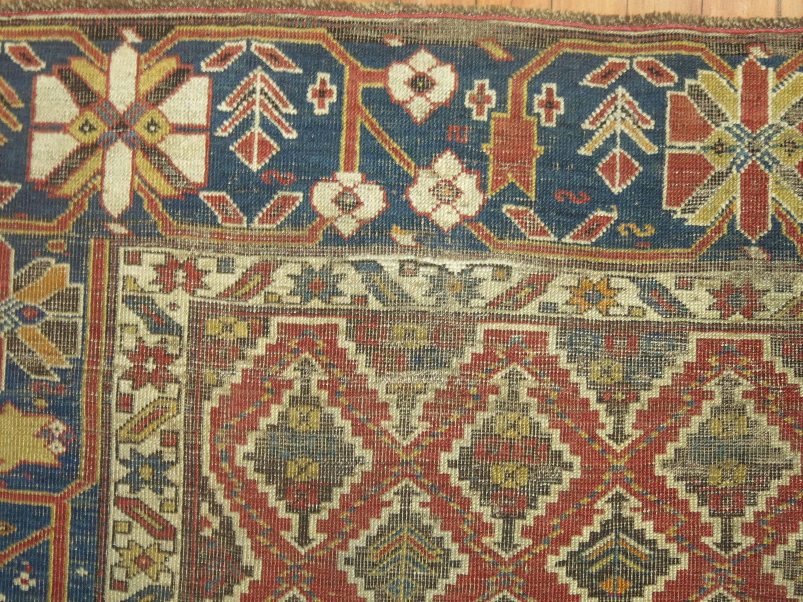 Wool 19th Century Rustic Caucasian Tribal Throw Rug For Sale