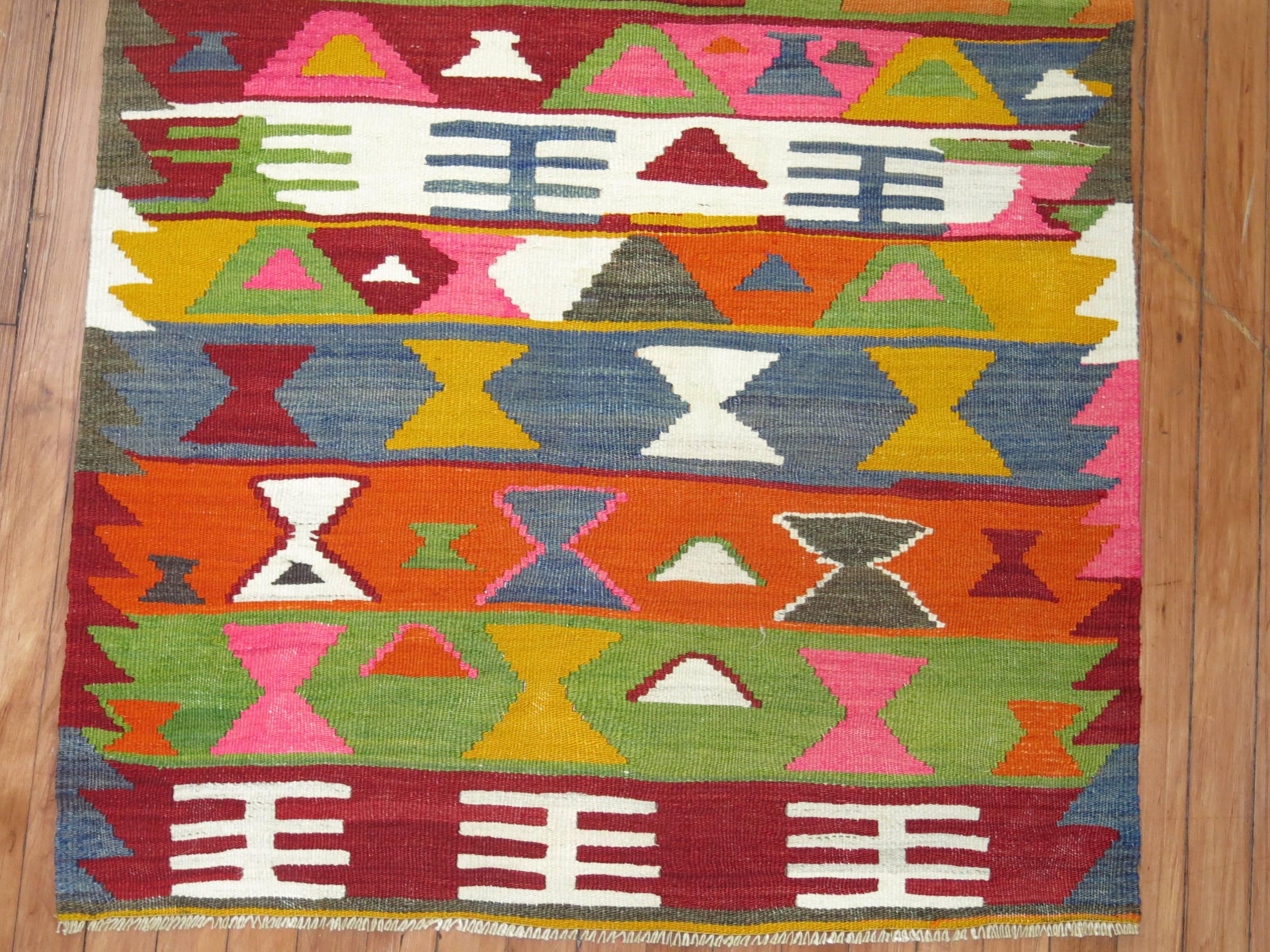 Jazzy colors highlight this vintage Turkish Kilim runner.  Take a Plunge !

3' x 9' mid 20th century