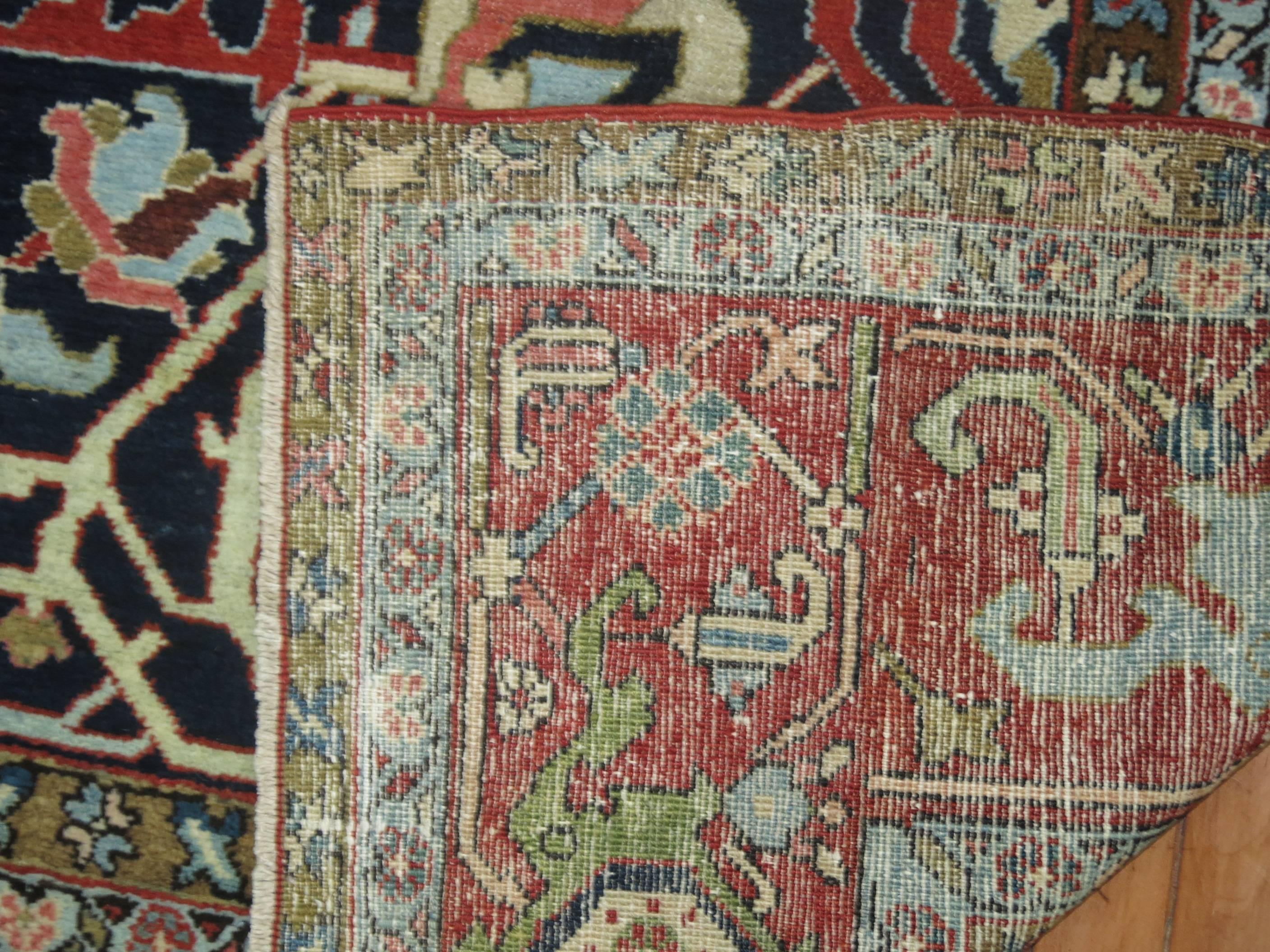 An extraordinary antique Persian Heriz Serapi rug with a rare all-over design.