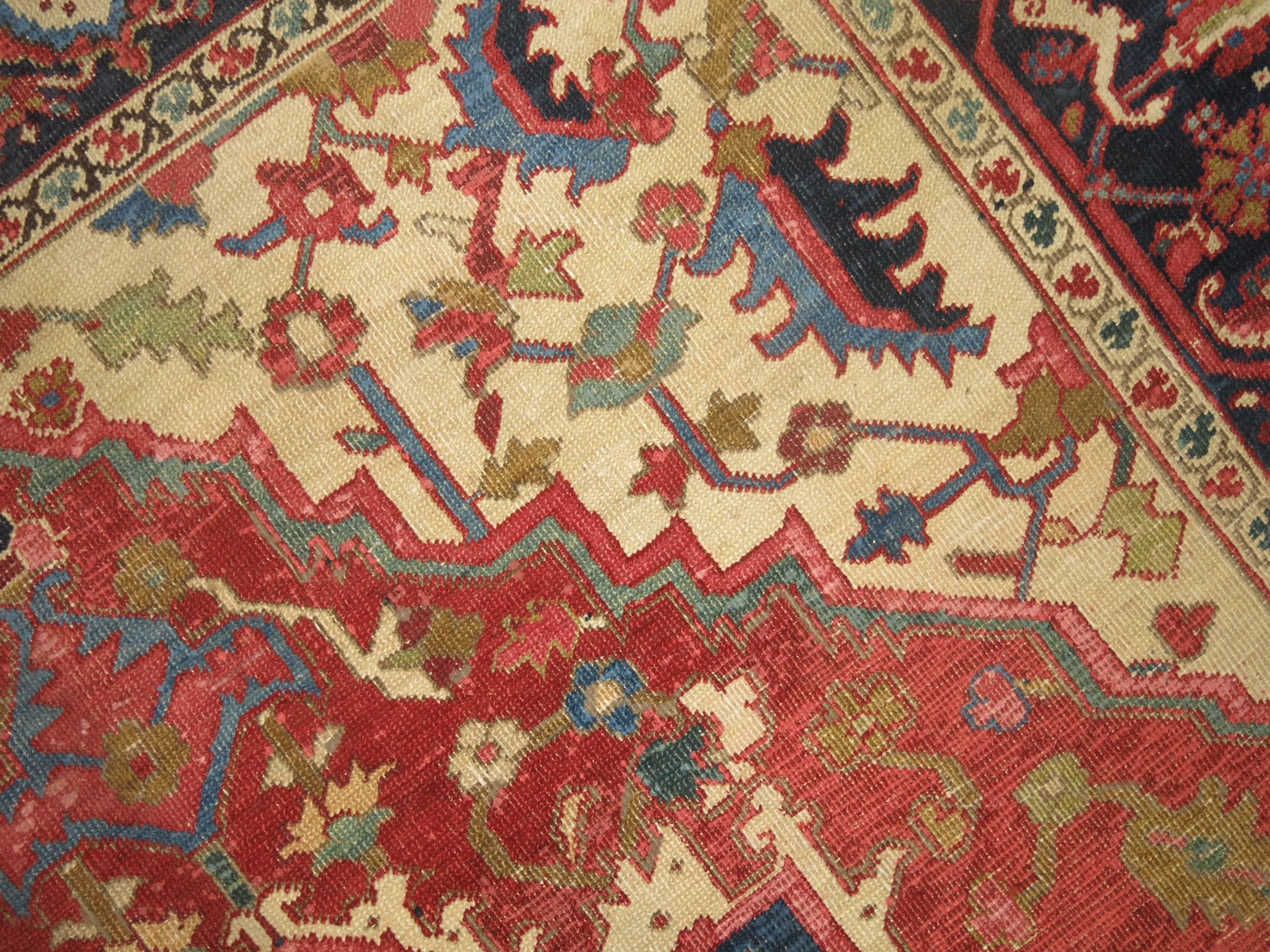 20th Century Antique Persian Serapi Rug