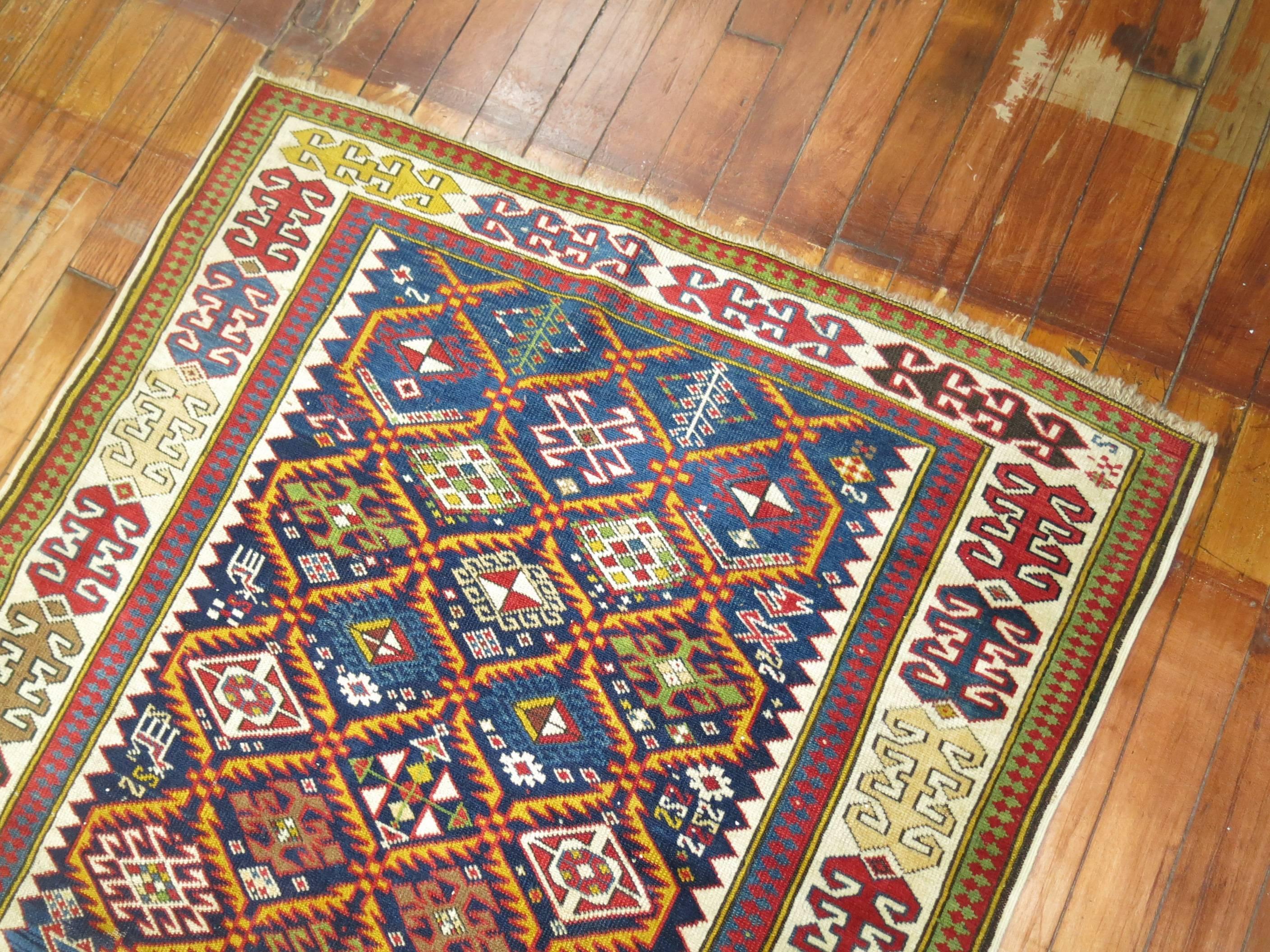 An early 20th century Caucasian Akstafa rug.

Antique Caucasian rugs from the Shirvan district village of Akstafa are among the rarest types of rugs from that region. Similar to Kazak carpets, Akstafa rugs often featured a limited palette of navy,
